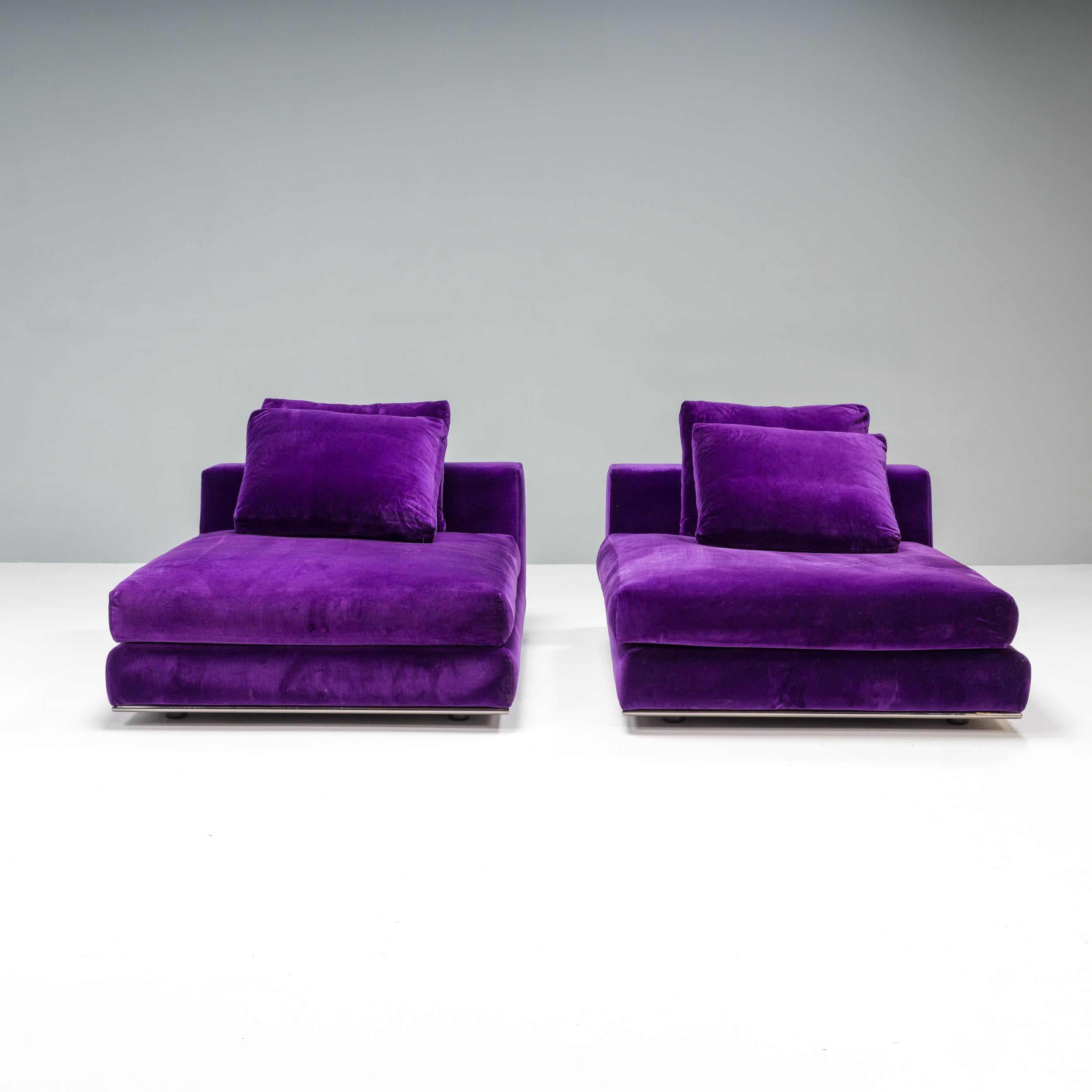 Designed by Minotti, these day beds allow for luxurious lounging. With generous proportions, the sofas sit on a slimline chrome frame which gives the impression they are floating slightly above the ground.

Fully upholstered in a bold purple velvet,