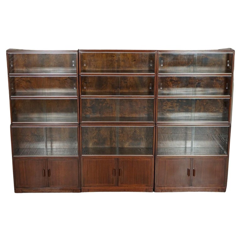 We are excited to present this stunning set of Minty bookcases made in Oxford.

In total it's a set of three bookcases which are able to be separate.

All sections come apart and are secured with 2 wooden blocks inside each section.

We have
