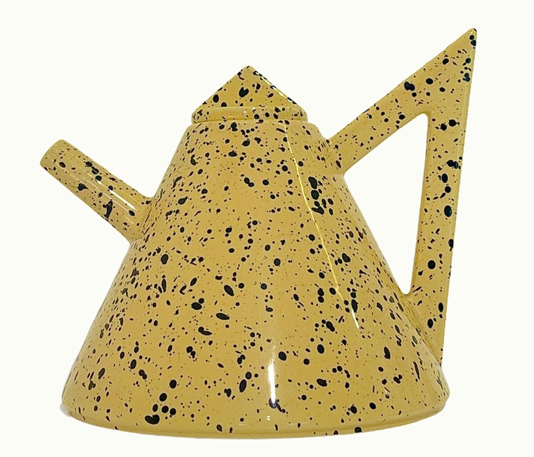 Let's face it, the 80's are back! This yellow and black-speckled teapot with four cups epitomizes Classic Memphis style design with its triangular handles. The tea set would have fit oh so perfectly in the favorite 80's hit TV show, Saved By The