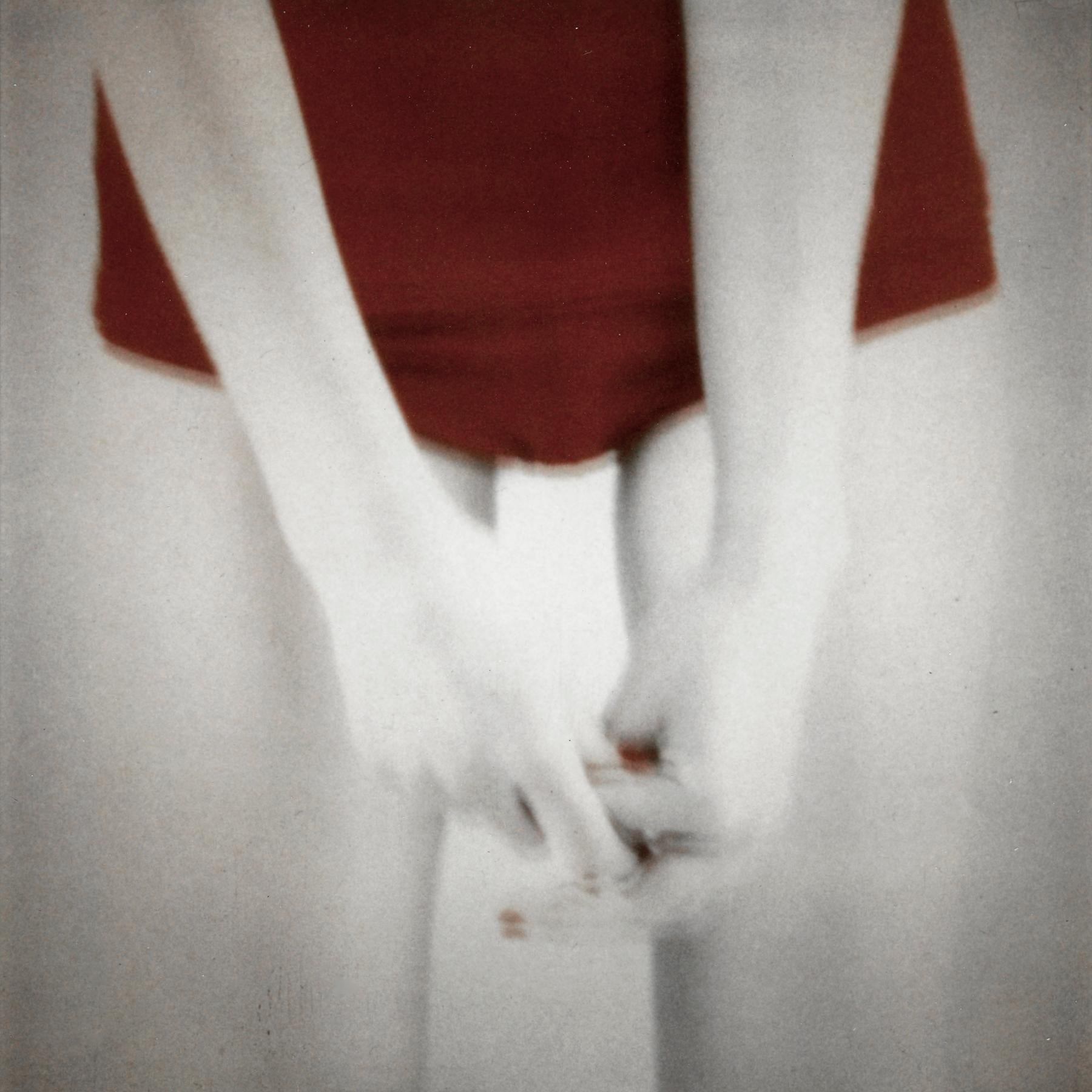 Hands on Red, by Mira Loew, from the “Bright Bodies” photography series