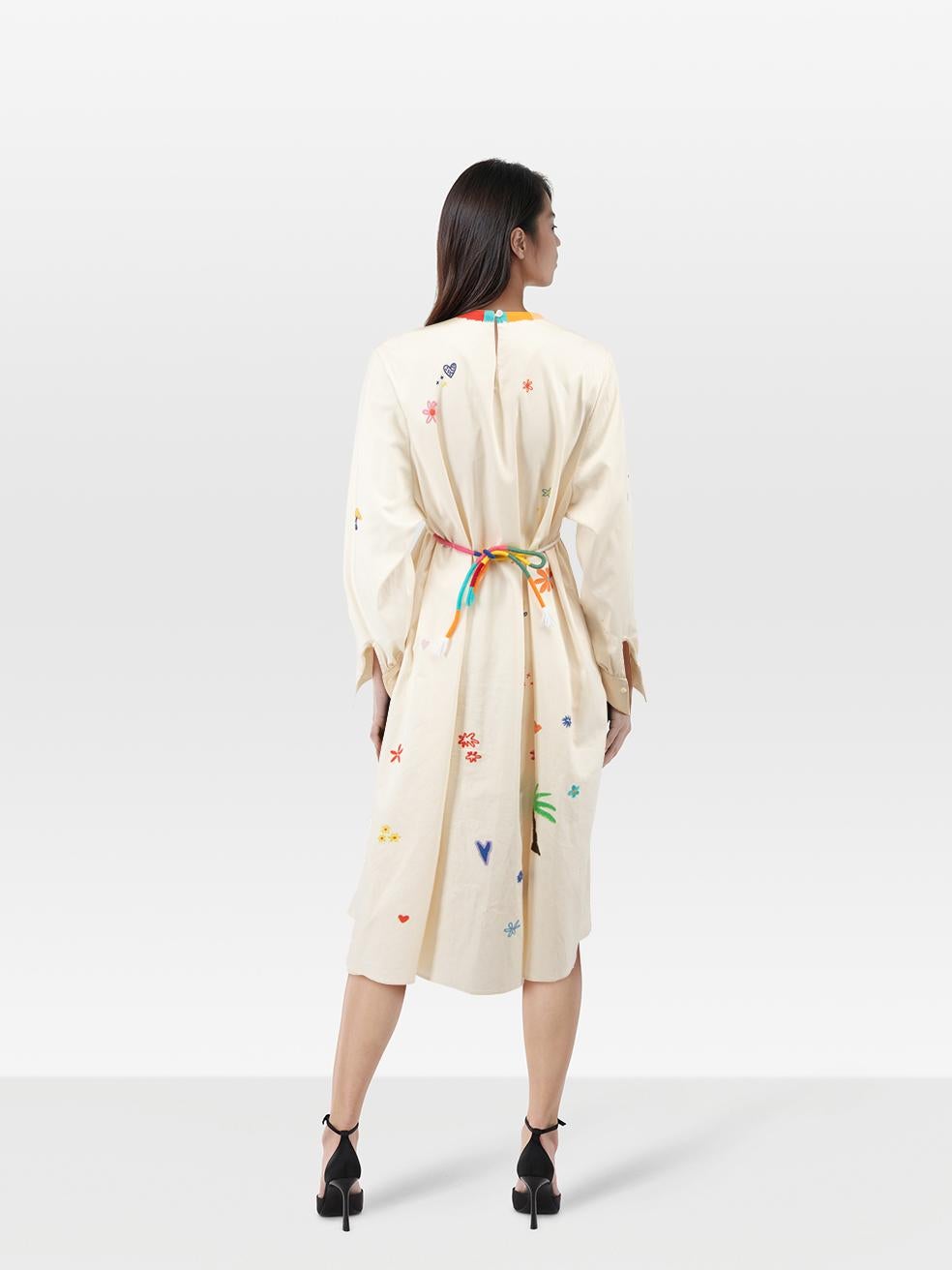 CONDITION is Very good. Minimal wear to the dress is evident. Discolouration around the neckline, front, back and both sleeves on this used Mira Mikati designer resale item. Discolouration may need gentle hand wash contrary to dry clean