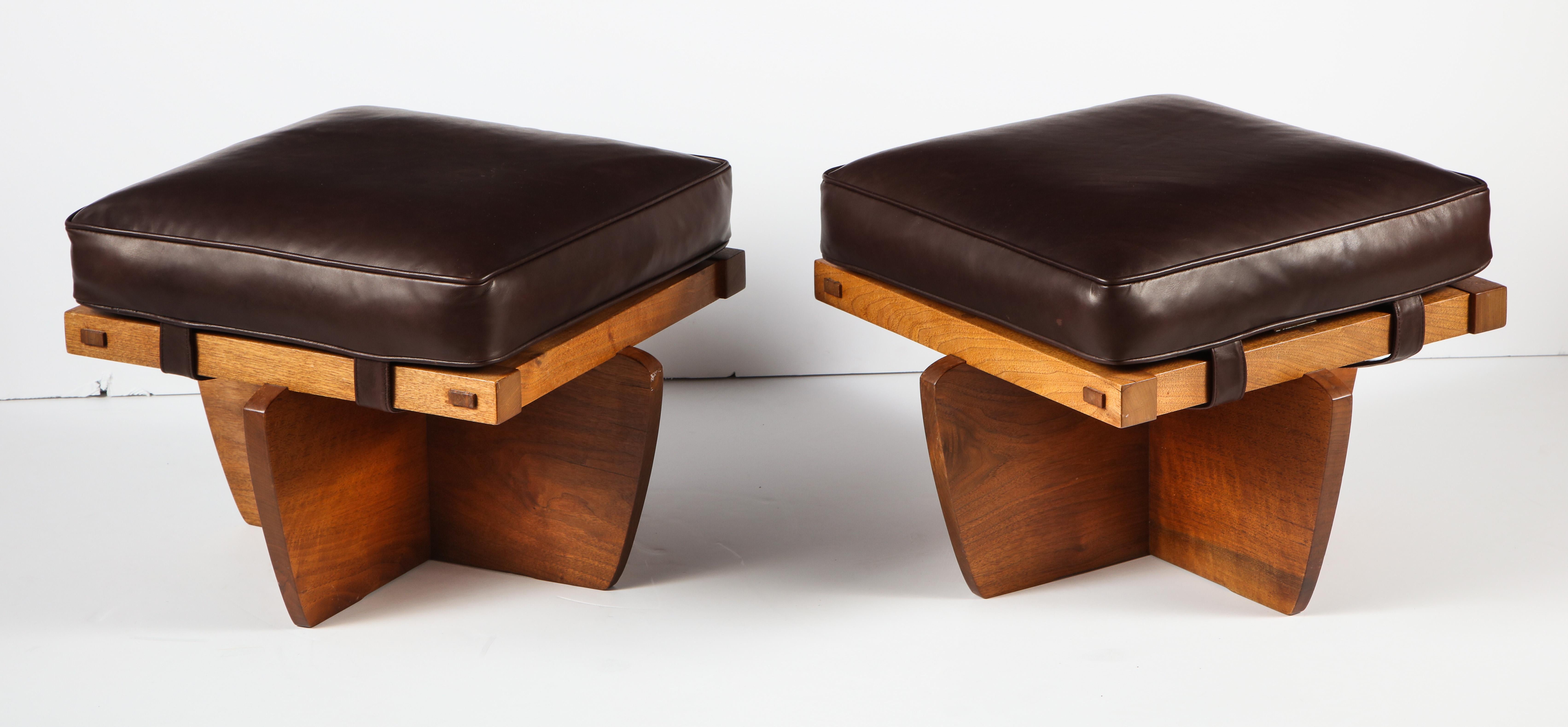 Rare and wonderful these ottoman or stools have Nakashima's very distinctive conoid base.