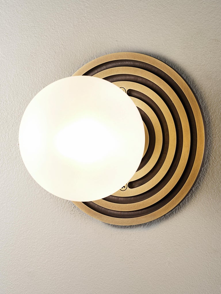 American Mira Round Wall Sconce in Natural Brass and Blown Glass by Blueprint Lighting For Sale