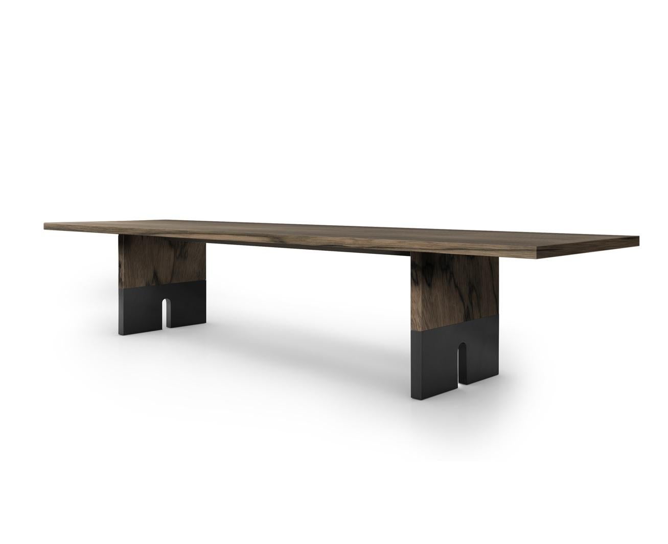 Mira table by LK Edition.
Dimensions: 380 x 105 x H 74 cm. 
Materials: exotic wood and metal. 

It is with the sense of detail and requirement, this research of the exception by the selection of noble materials and his culture of the French