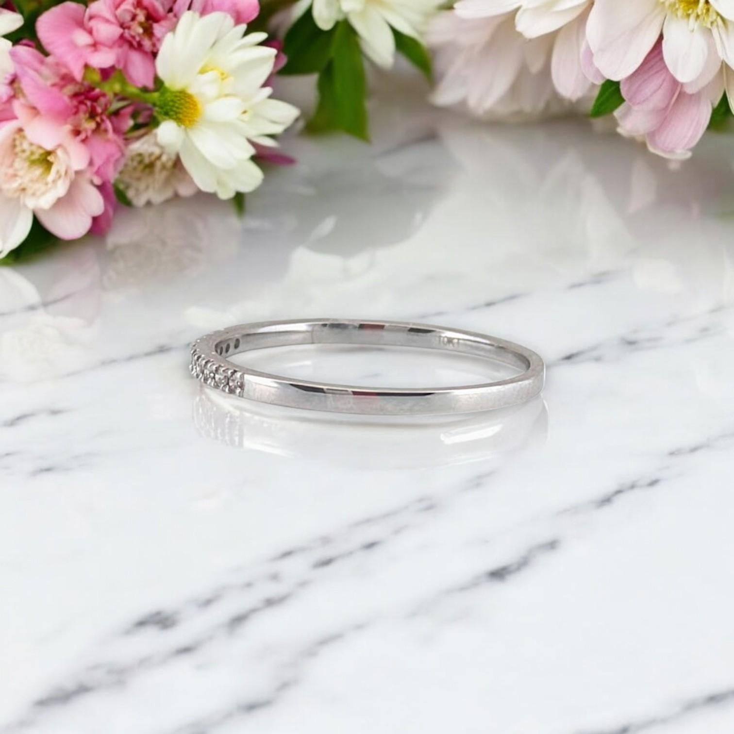 💎 10K White Gold Diamond Band  0.06 CTW, Size 6.75

Simple, elegant, and effortlessly chic—this 10K white gold diamond band features 0.06 carats of natural round diamonds for a delicate yet radiant sparkle. Its sleek, minimalist design makes it an