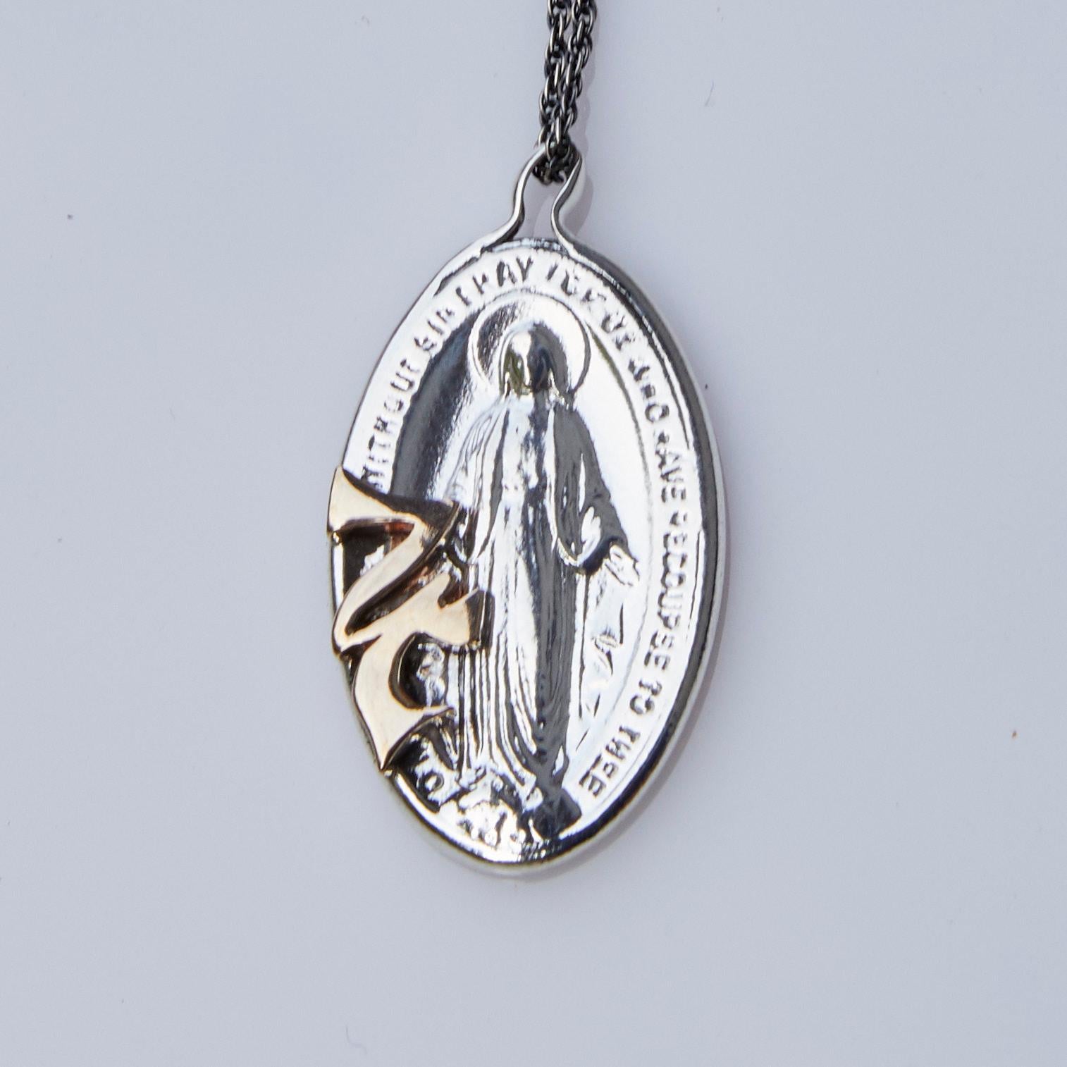 Miraculous Medal Oval Virgin Mary Jupiter Necklace Silver J DAUPHIN

J DAUPHIN Necklace Made in gold and silver 

The use of Medals and other sacred symbols can have several reason, some wear them as a sort of protection. Some wear saint medals as a