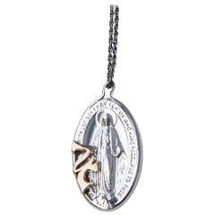 J Dauphin, collier Jupiter ovale en or et argent avec médaille de la Vierge Marie