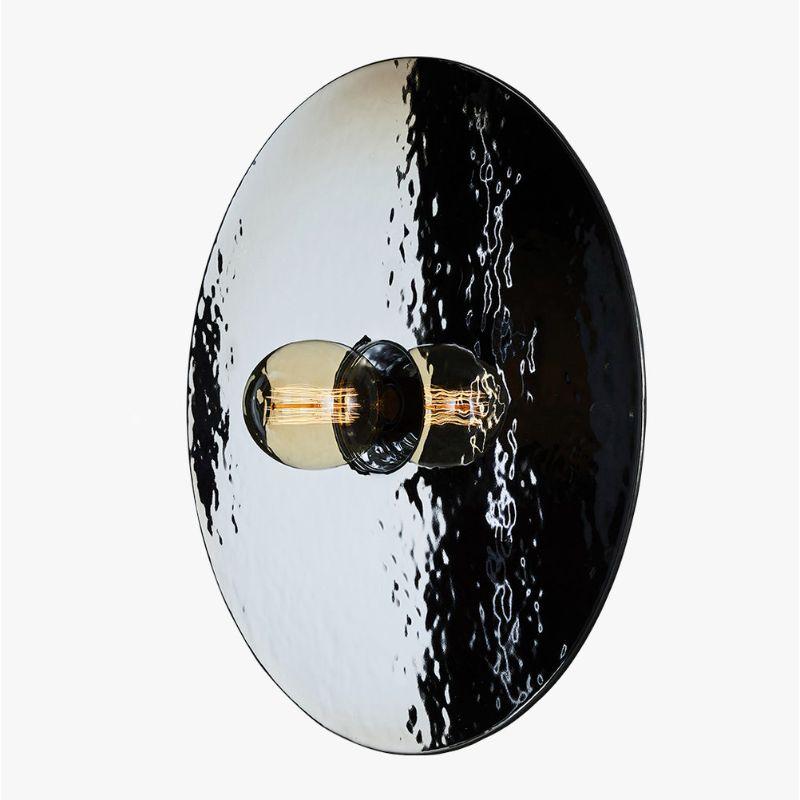 Mirage wall light, silver & large by RADAR
Design: Bastien Taillard
Materials: Thermoformed silver glass, metal.
Dimensions: Depth 10 x Diameter 70 cm

Also available: In gold or bronze and size mall (Diameter: 50). Wall base available in black