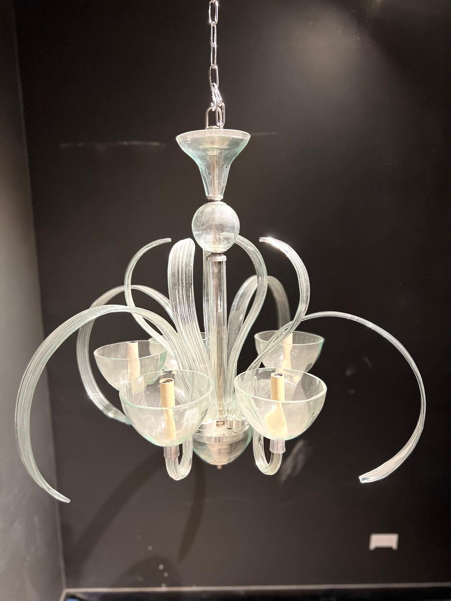 A Mirando clear glass chandelier with unique shape, circa 1940s. In very good vintage condition.

Dealer: G302YP