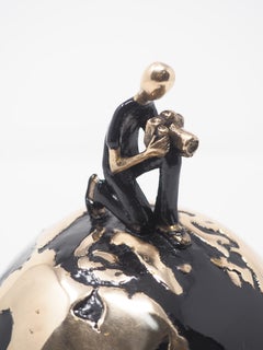 "Capturing Moments" figurative bronze sculpture relax carefree boy travel life