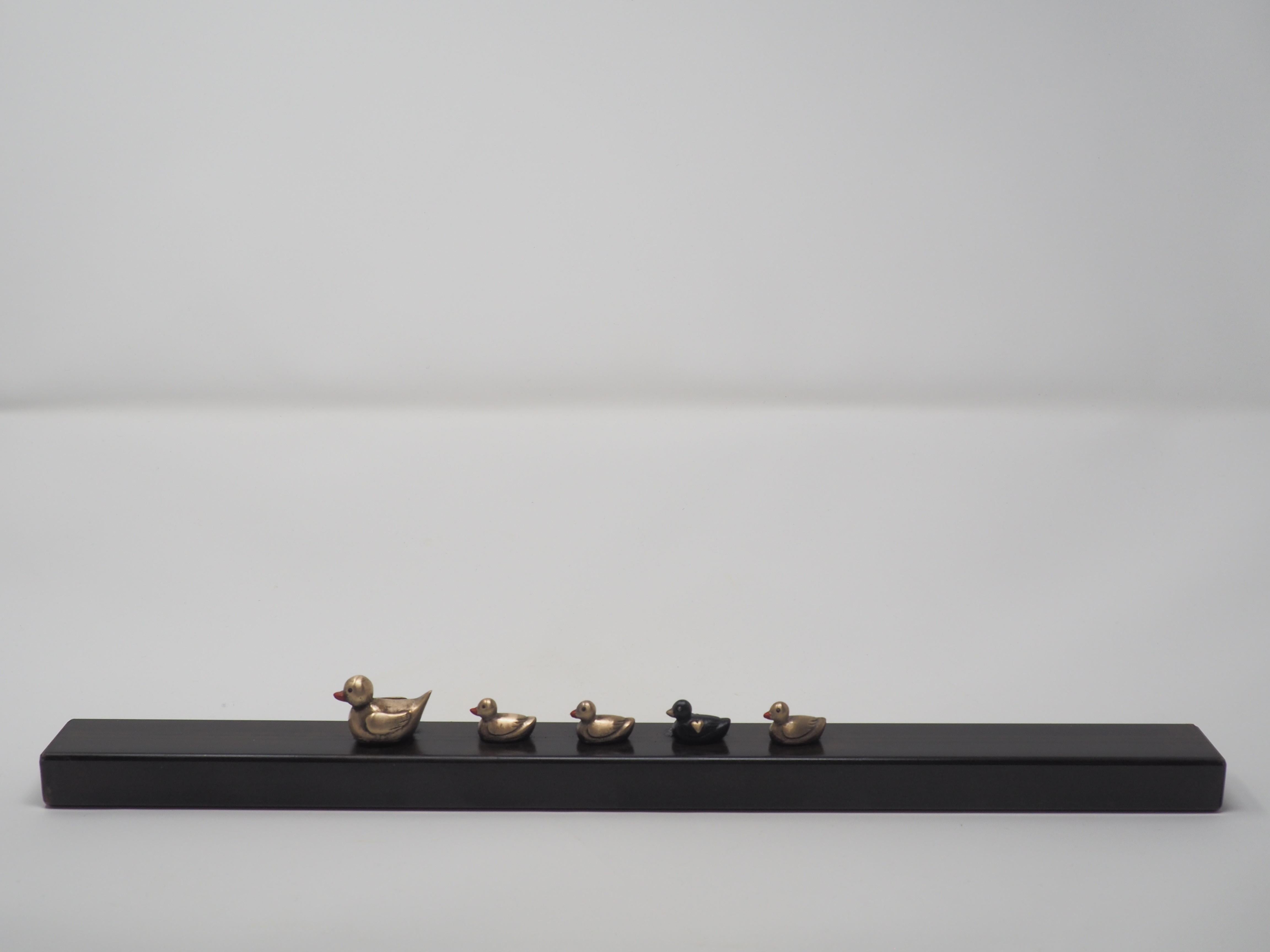 Mireia Serra Figurative Sculpture - "Golden Heart" figurative bronze wall sculpture love kindness family together