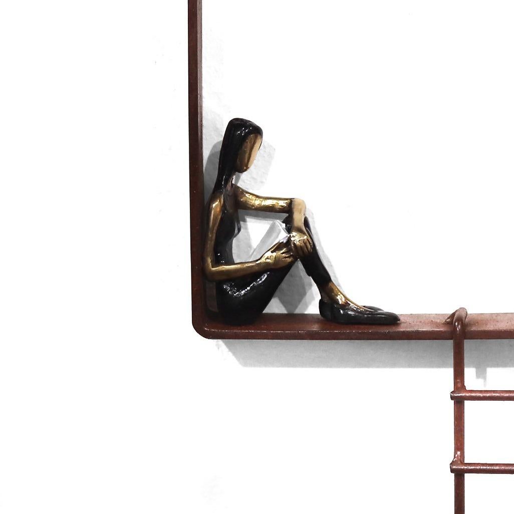Mireia Serra creates sensuous bronze and iron sculptures showing the beauty of snapshots caught in life which are full of emotions and feelings along the life journey. Her metal artworks capture the beauty of moments: A young lady challenged by the