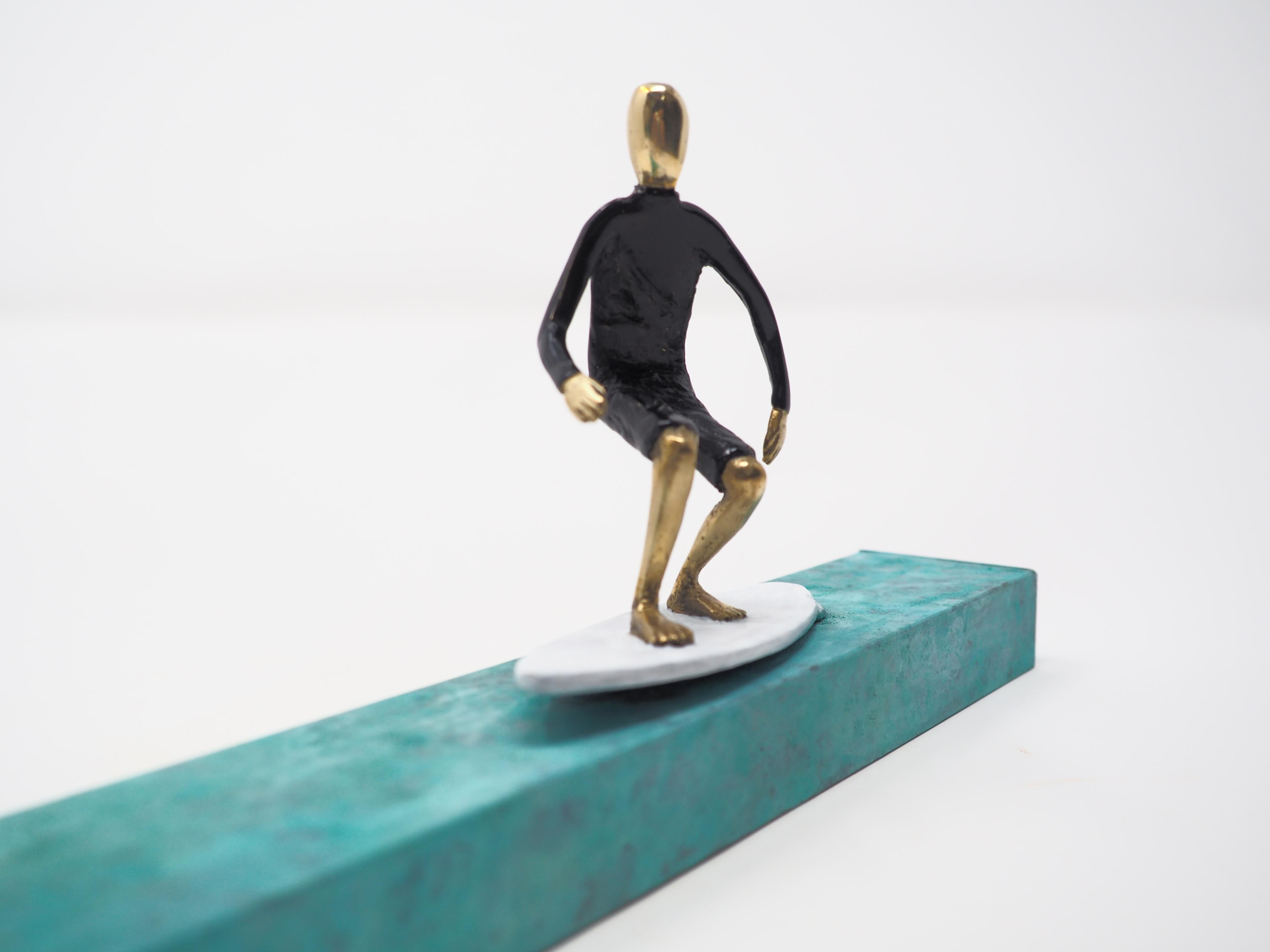 Into the barrel- bronze and brass small figurative man surfer mural sculpture  - Sculpture by Mireia Serra