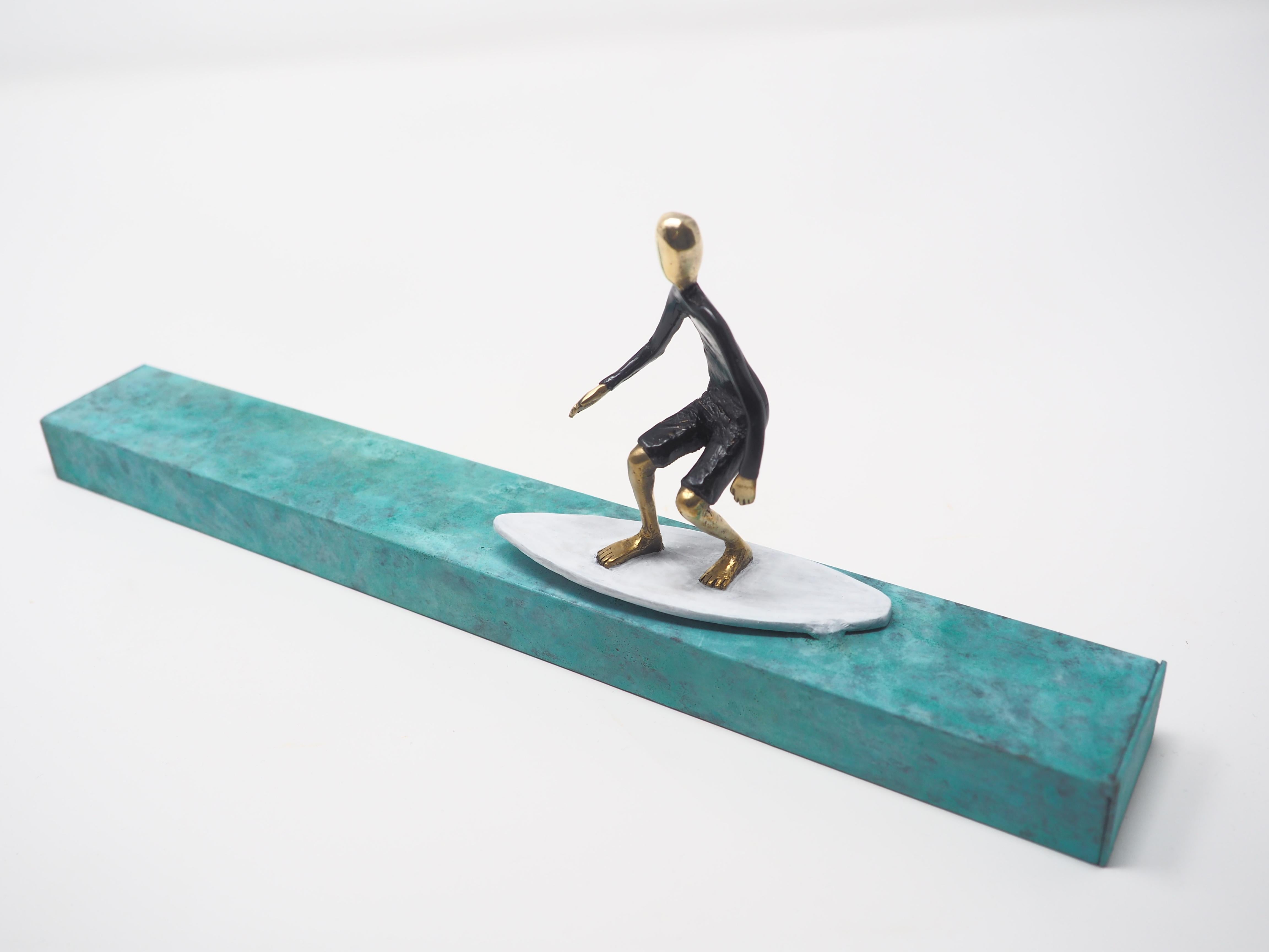Into the barrel- bronze and brass small figurative man surfer mural sculpture  - Contemporary Sculpture by Mireia Serra