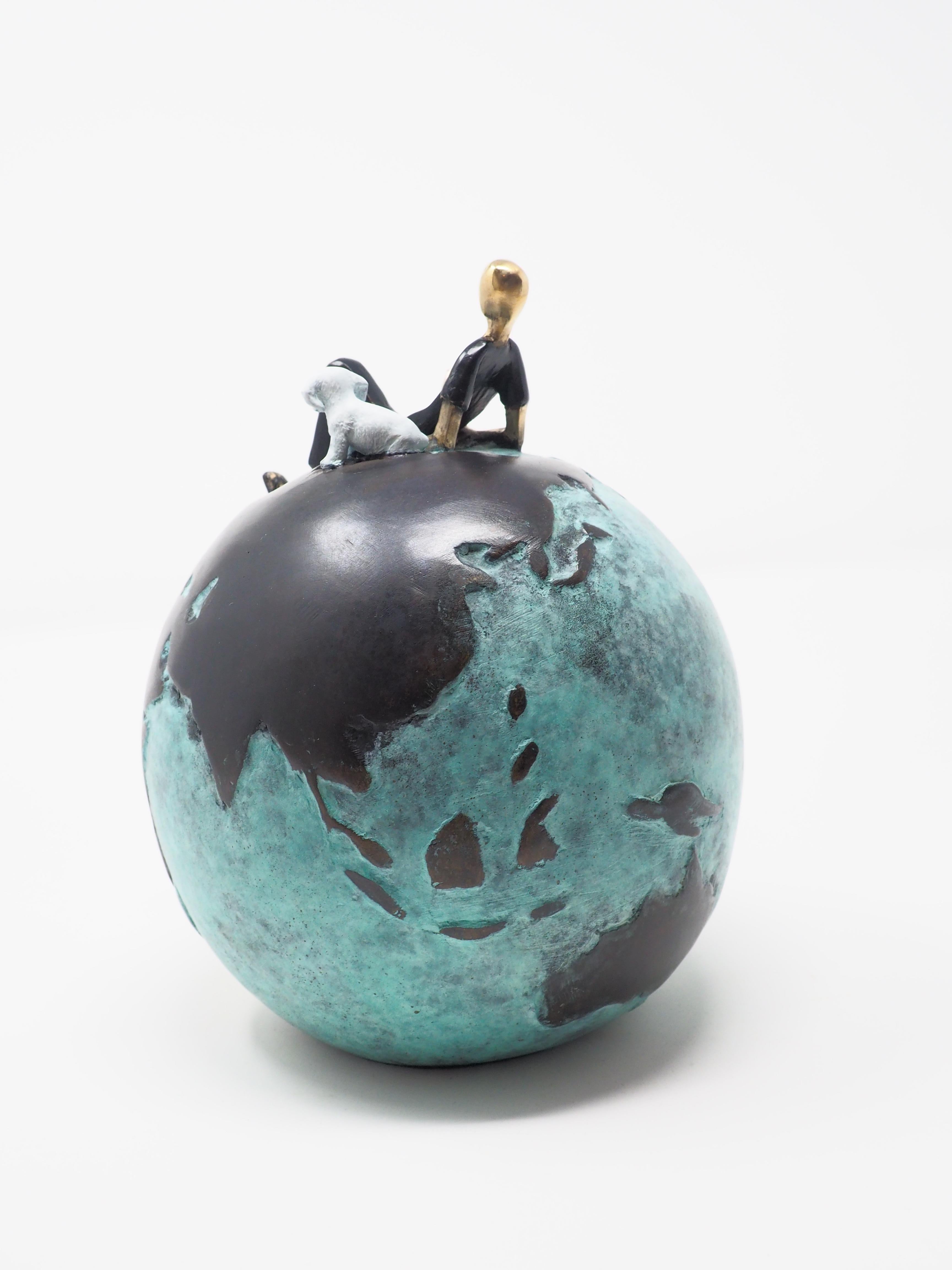 Laid back- figurative bronze sculpture of a man with a dog on a globe - Contemporary Sculpture by Mireia Serra