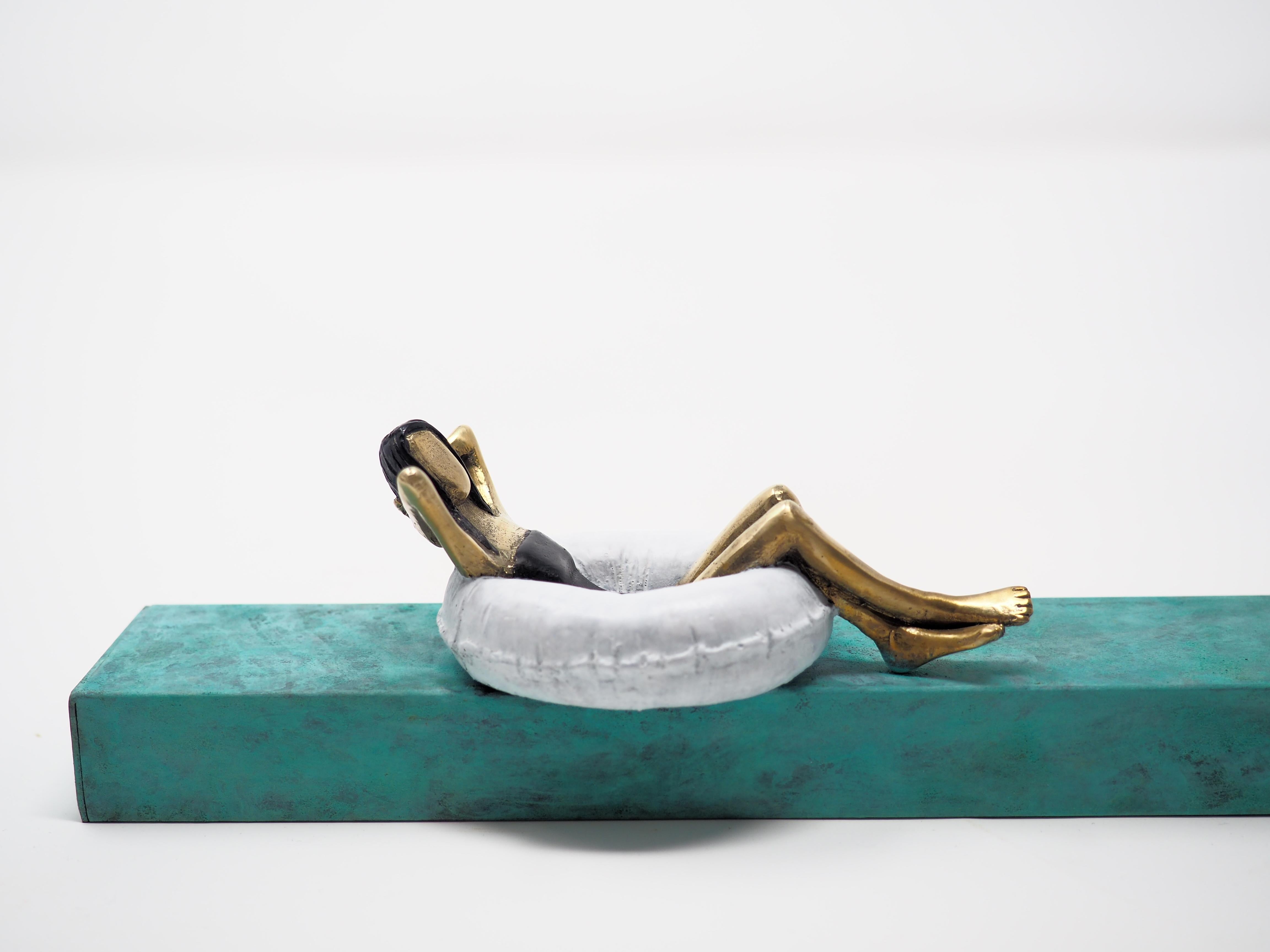 Rock the boat- bronze and iron small figurative mural sculpture with lying woman - Sculpture by Mireia Serra