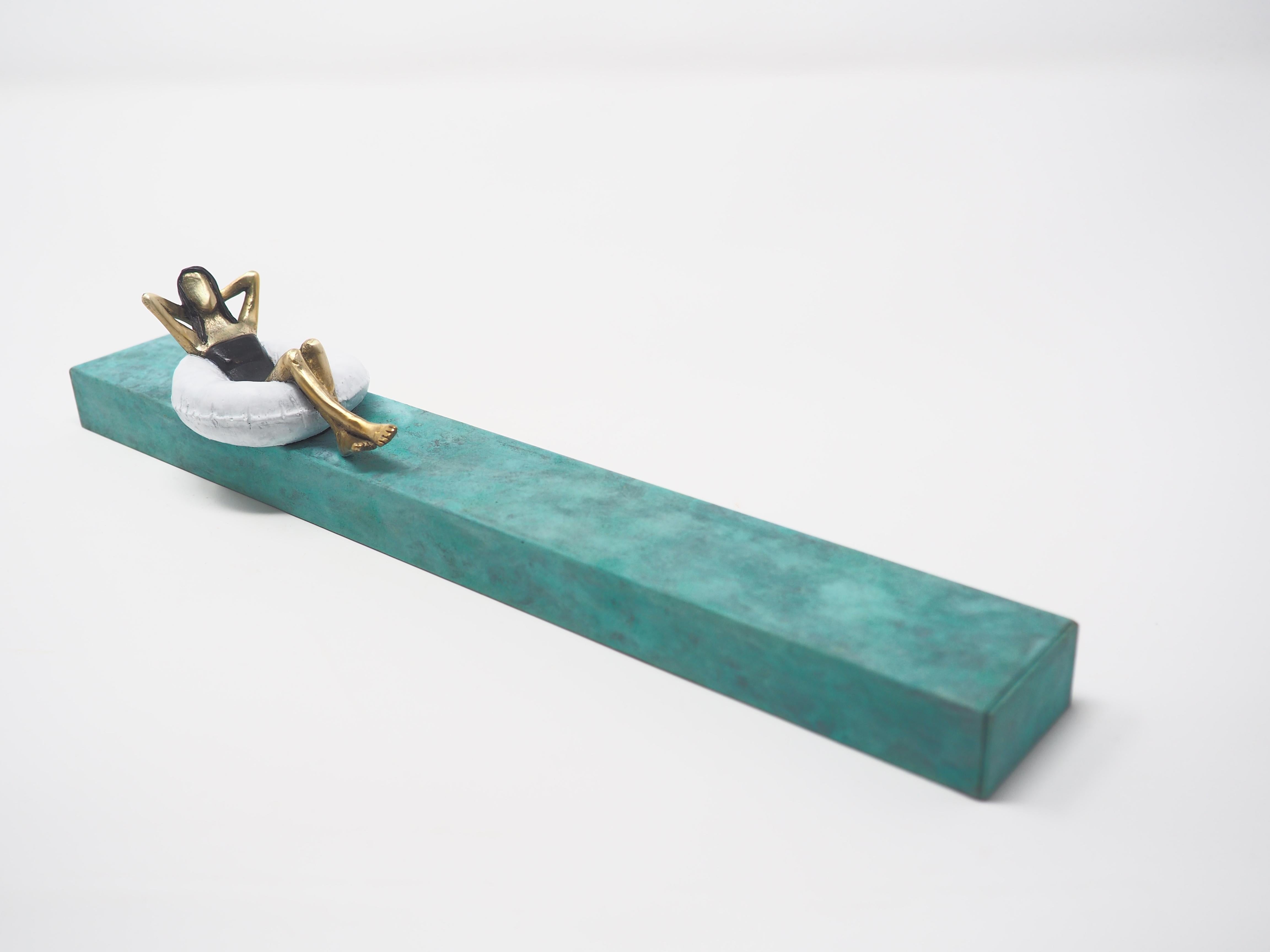 Rock the boat- bronze and iron small figurative mural sculpture with lying woman - Contemporary Sculpture by Mireia Serra