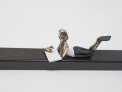 "Shared Secrets" contemporary figurative bronze wall sculpture reading books
