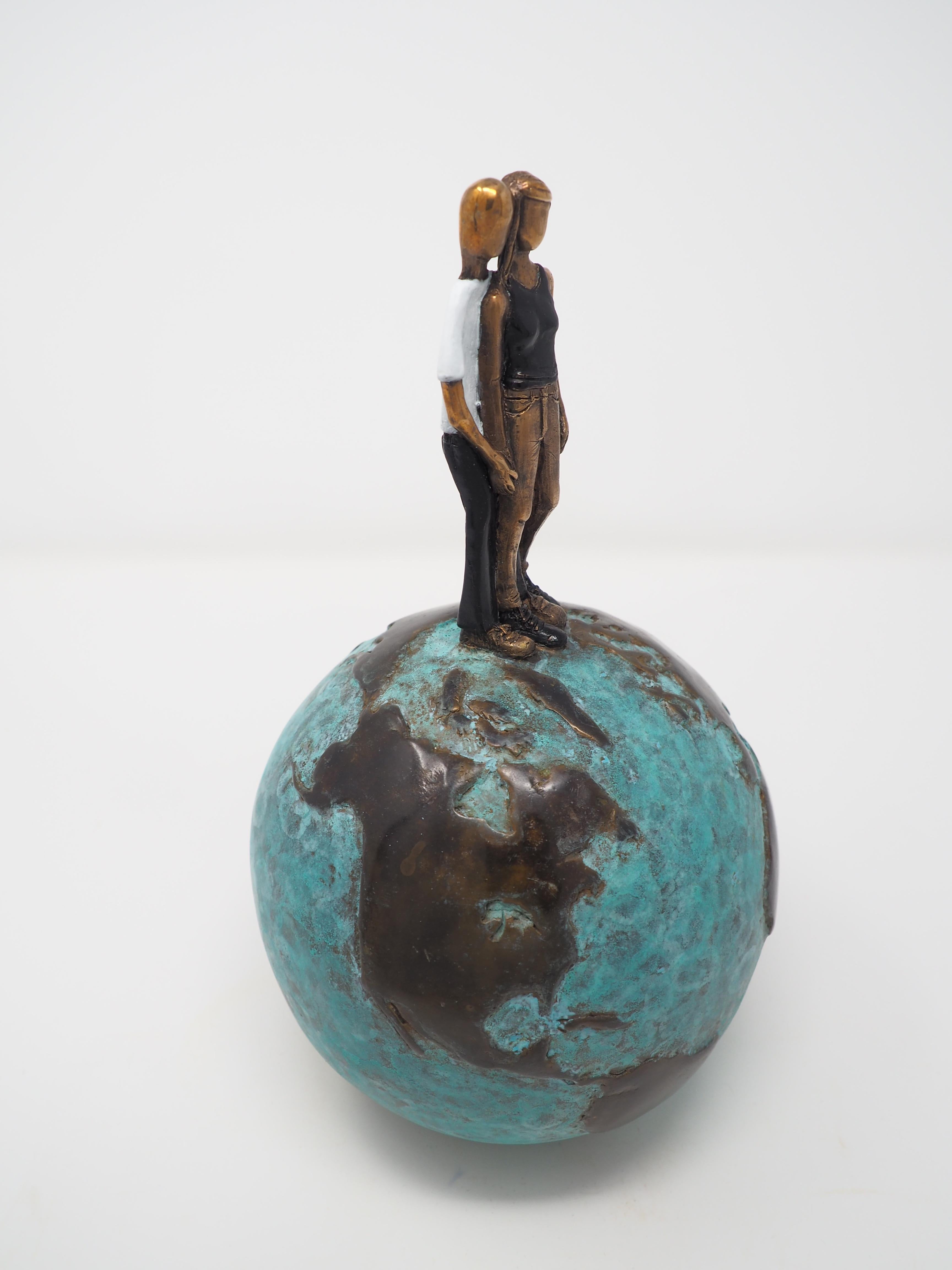 With You is the 2025 creation by Mireia Serra, as a continuation of her World Series depicting love and rapport of couples. This edition of Mireia is made of bronze with green patina (the ocean) and polished bronze that gives the bronze appearance