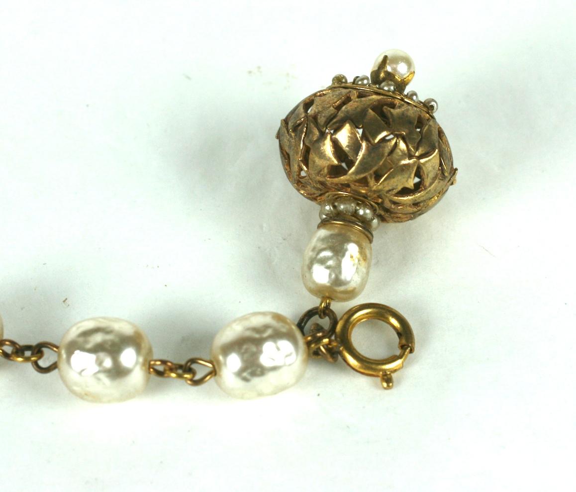 Women's Miriam Haskell Baroque Pearl and Gilt Filigree Fob Bracelet For Sale