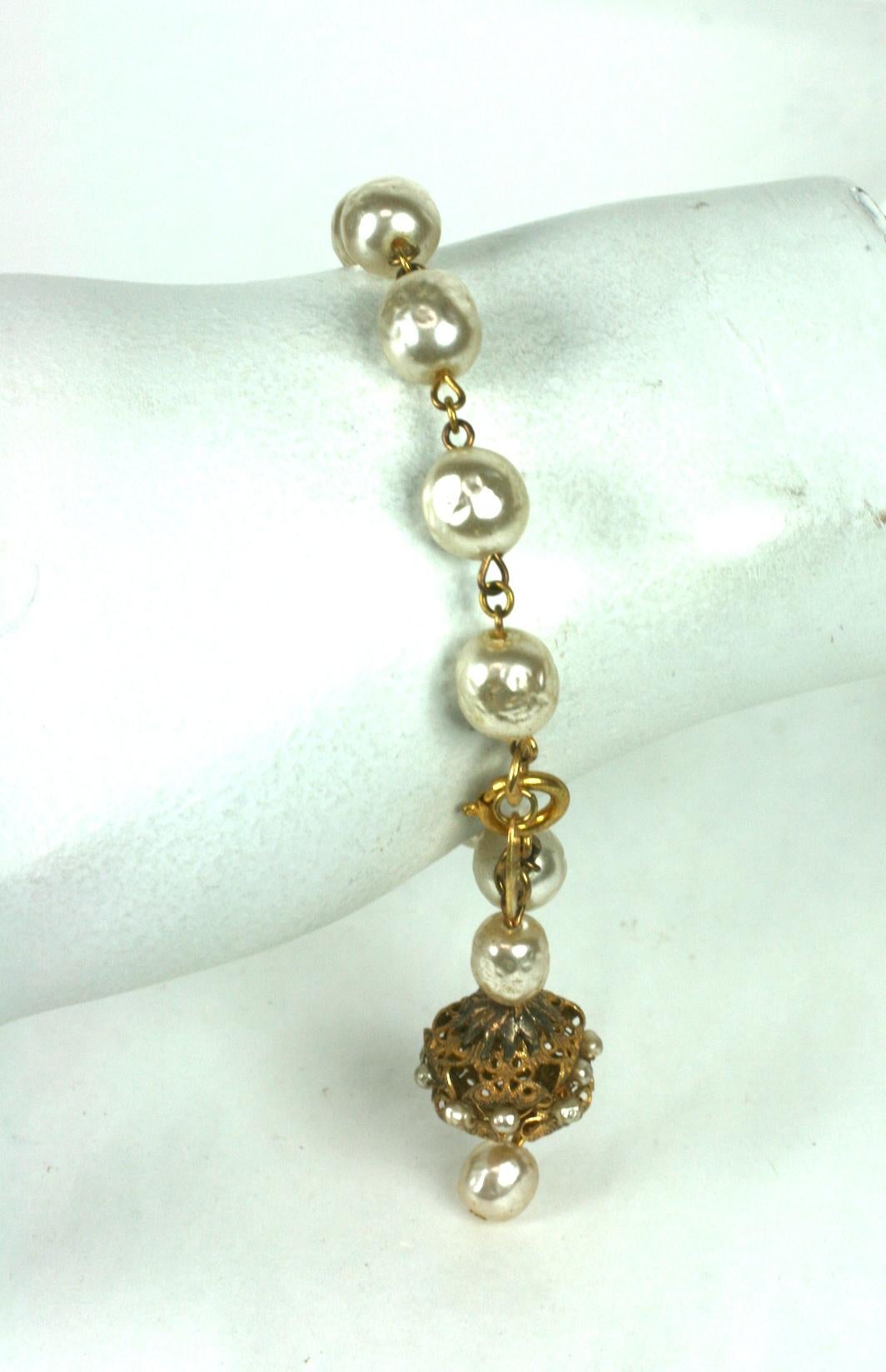 Miriam Haskell Baroque Pearl and Gilt Filigree Fob Bracelet In Excellent Condition For Sale In New York, NY