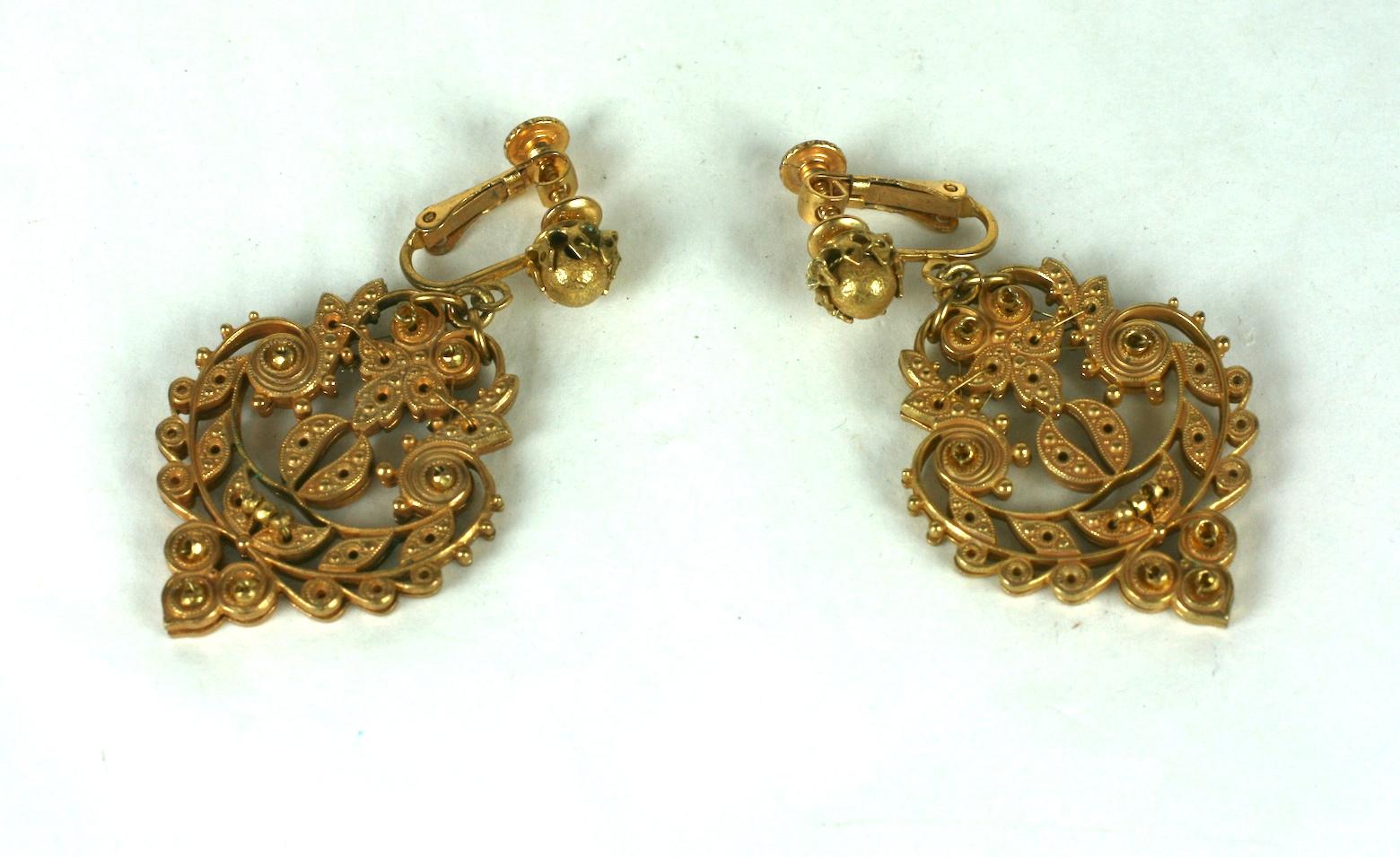 Miriam Haskell signature Russian Gilt Etruscan Revival pendant earrings. Made of  back to back gilt filigrees, textured gilt brass beads, accented with small gold plate cut steel beads.
Excellent Condition, Signed, Clip Back Fittings
Length 2
