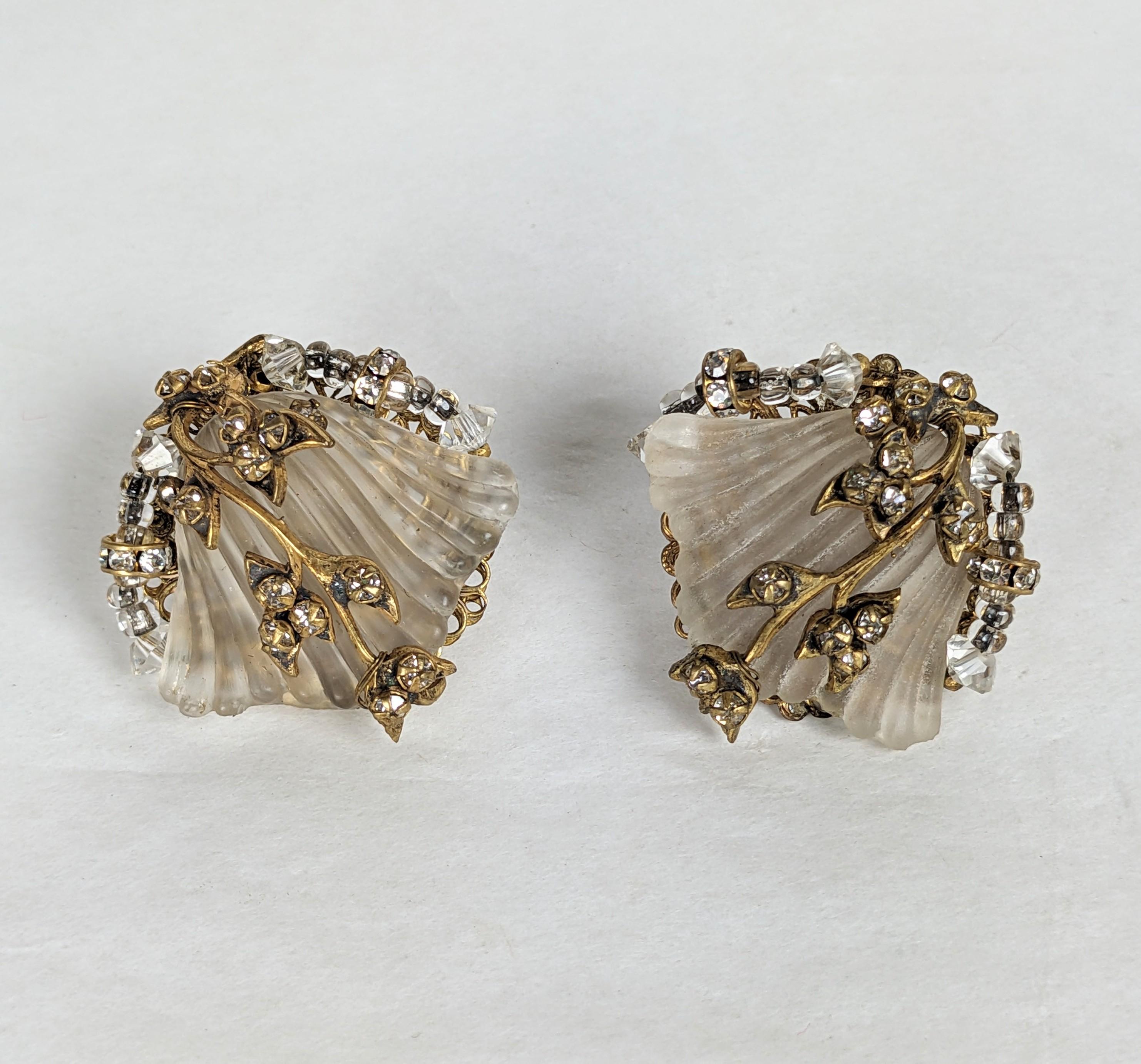 Miriam Haskell Frosted Crystal and Diamonte Earrings from the 1950's. Frosted crystal tulips are set within leafy vines decorated with crystal pastes. Adjustable clip back fittings. 1.25