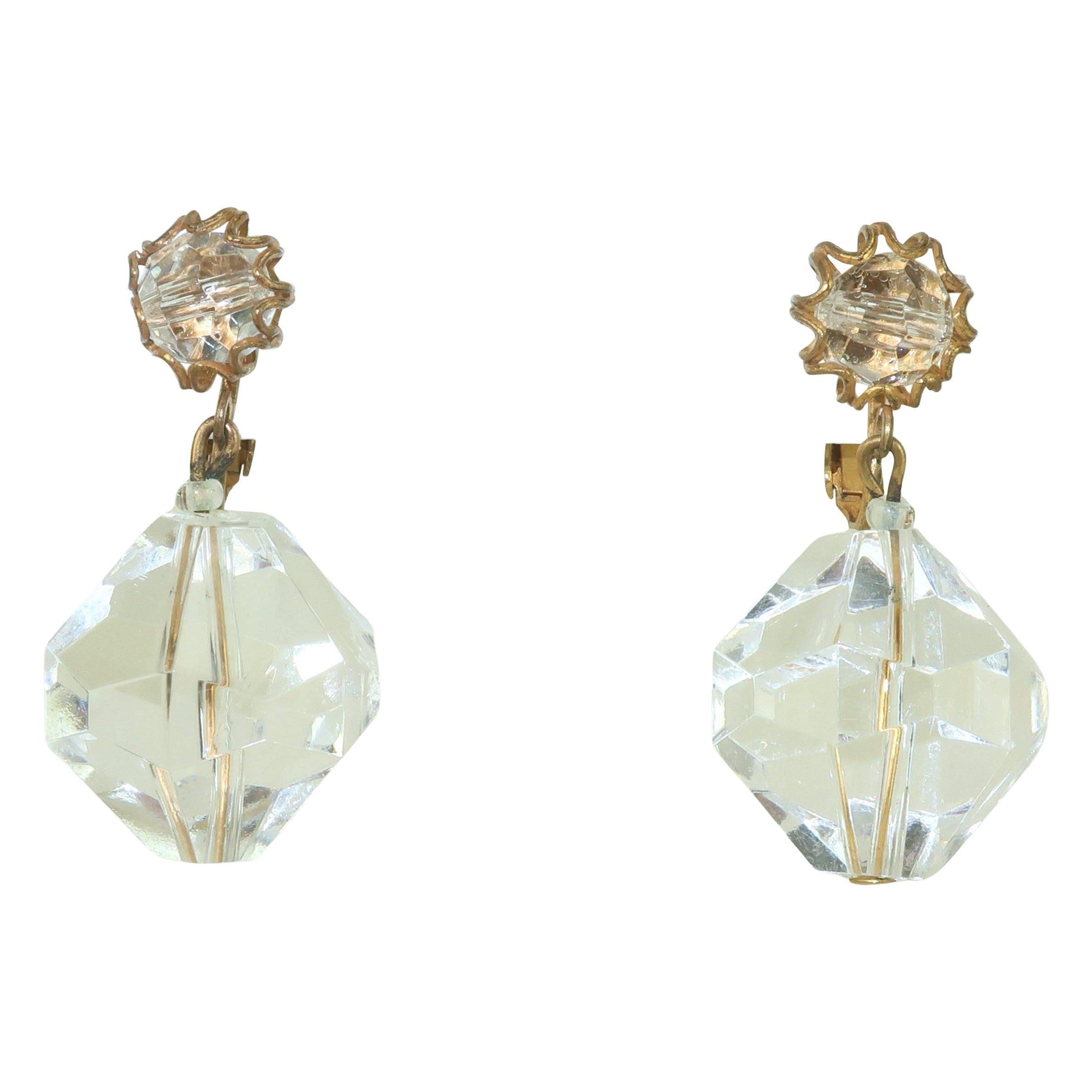 MIRIAM HASKELL Pendants d'oreilles en lucite et or, années 1960
