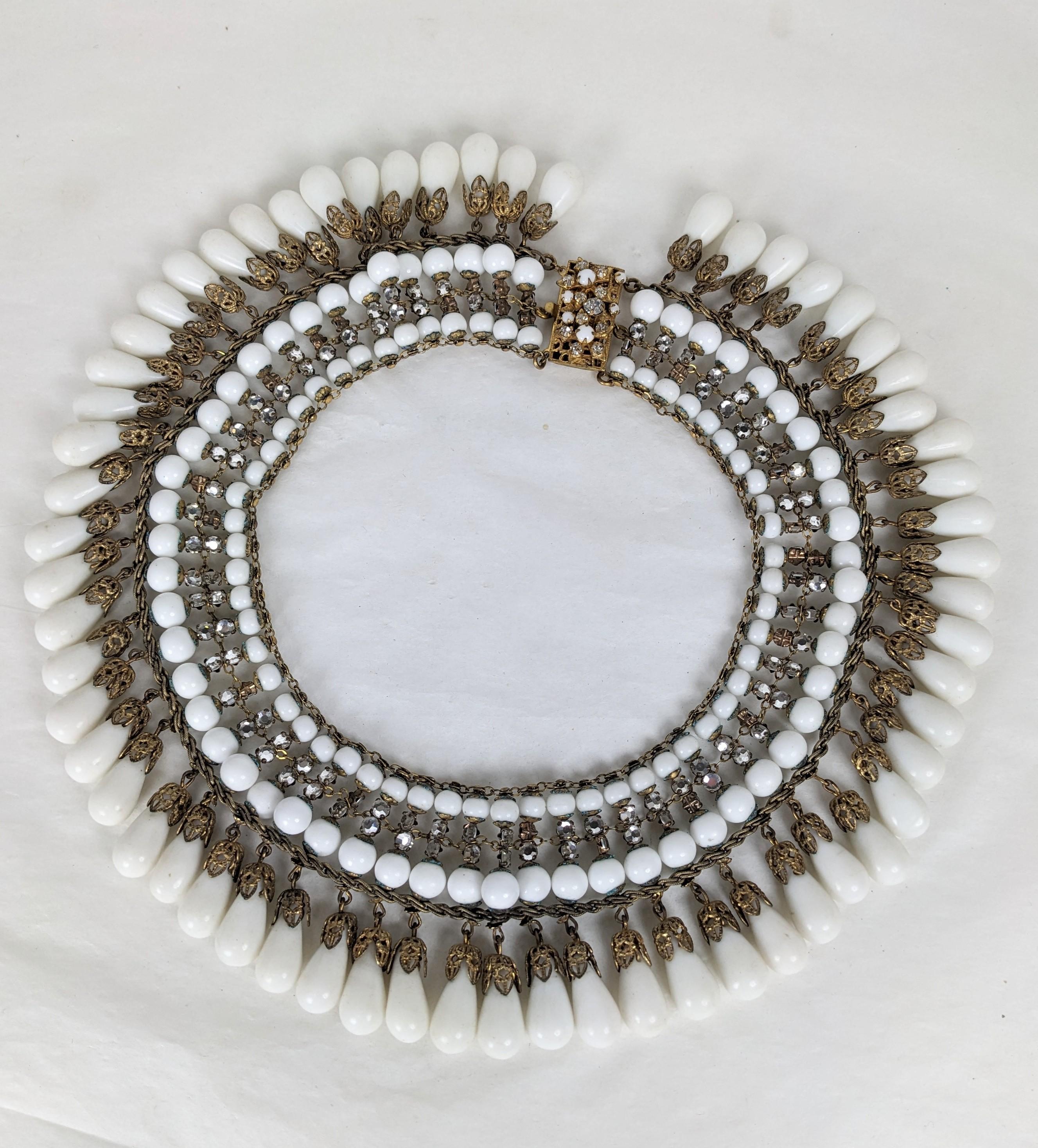 Impressive, Rare Miriam Haskell Milk Glass Pave Collar from the 1940's. Large scale with elaborate construction with hundreds of hand sewn rose montee crystals set on bars with gilt filigrees and milk glass pate de verre hand made beads. Clasp of