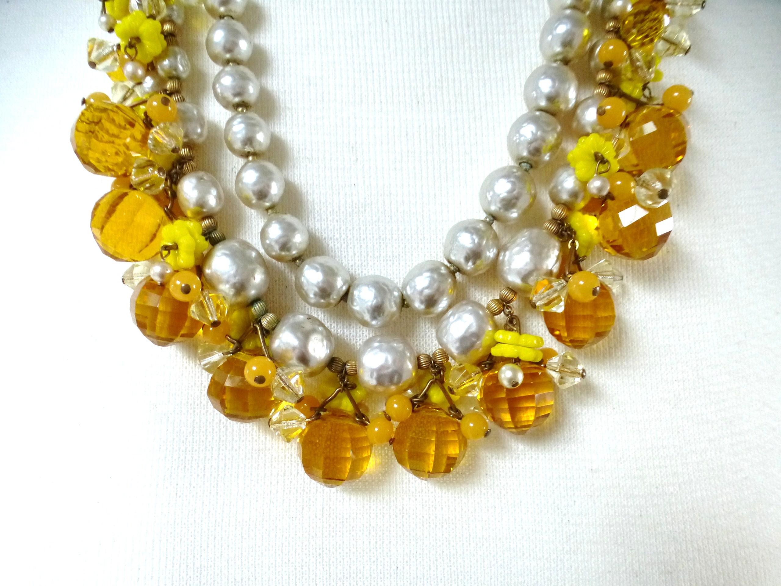 Artisan MIRIAM HASKELL necklace book piece 1950s with many cut yellow glass balls For Sale