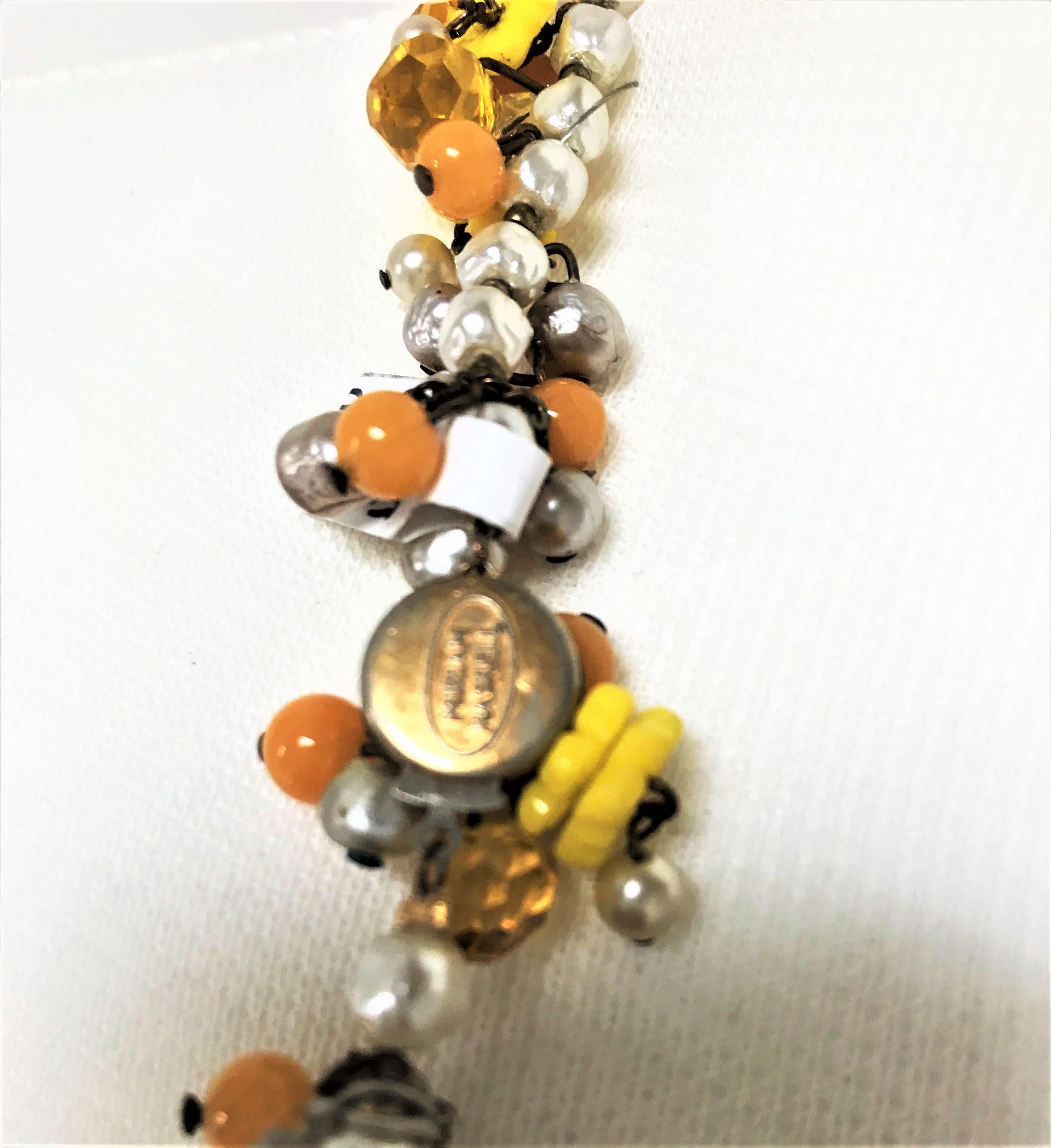 Women's MIRIAM HASKELL necklace book piece 1950s with many cut yellow glass balls For Sale