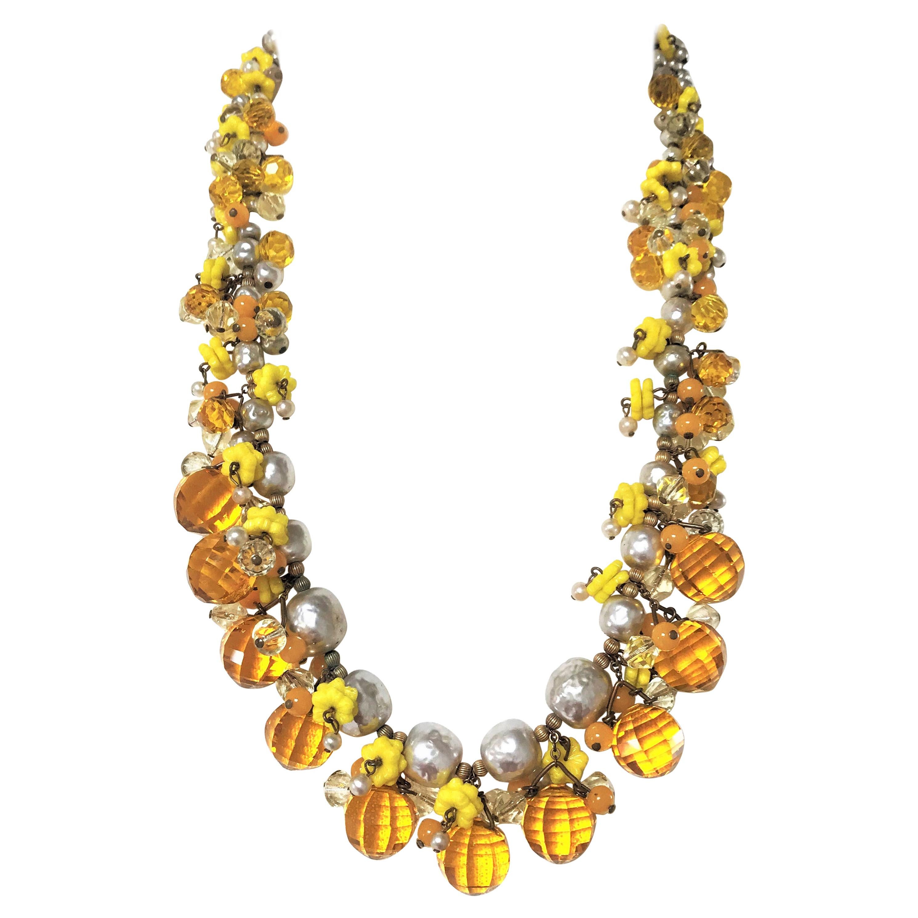 MIRIAM HASKELL necklace book piece 1950s with many cut yellow glass balls