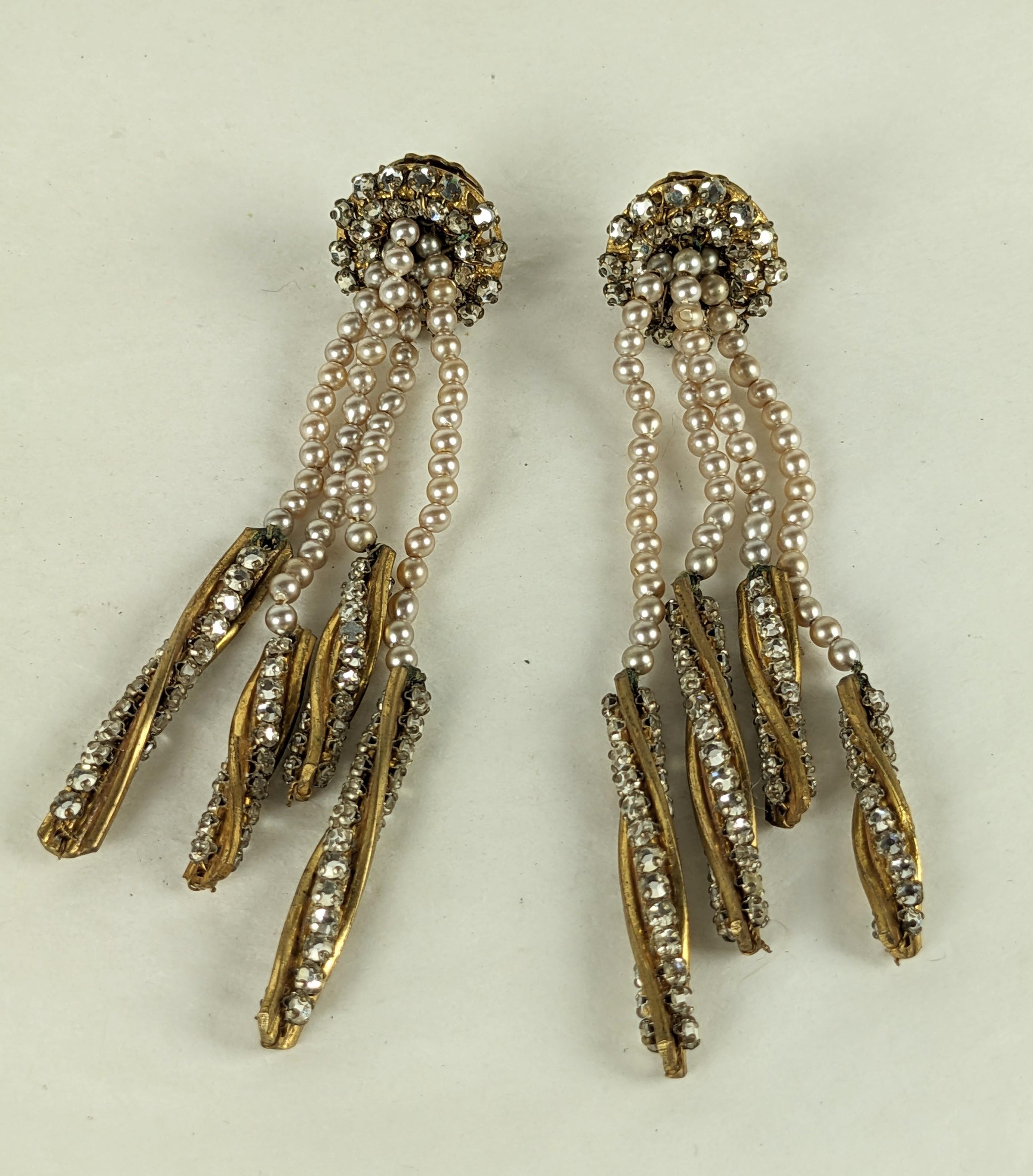 Exceptional Long Miriam Haskell Pearl and Rose Montee Drop Earrings with clip back fittings. Rose Montee crystals are hand sewn on clip as well as on twisted gilt drops which fall from vari length faux pearls. Super striking scale. 1950's USA. 