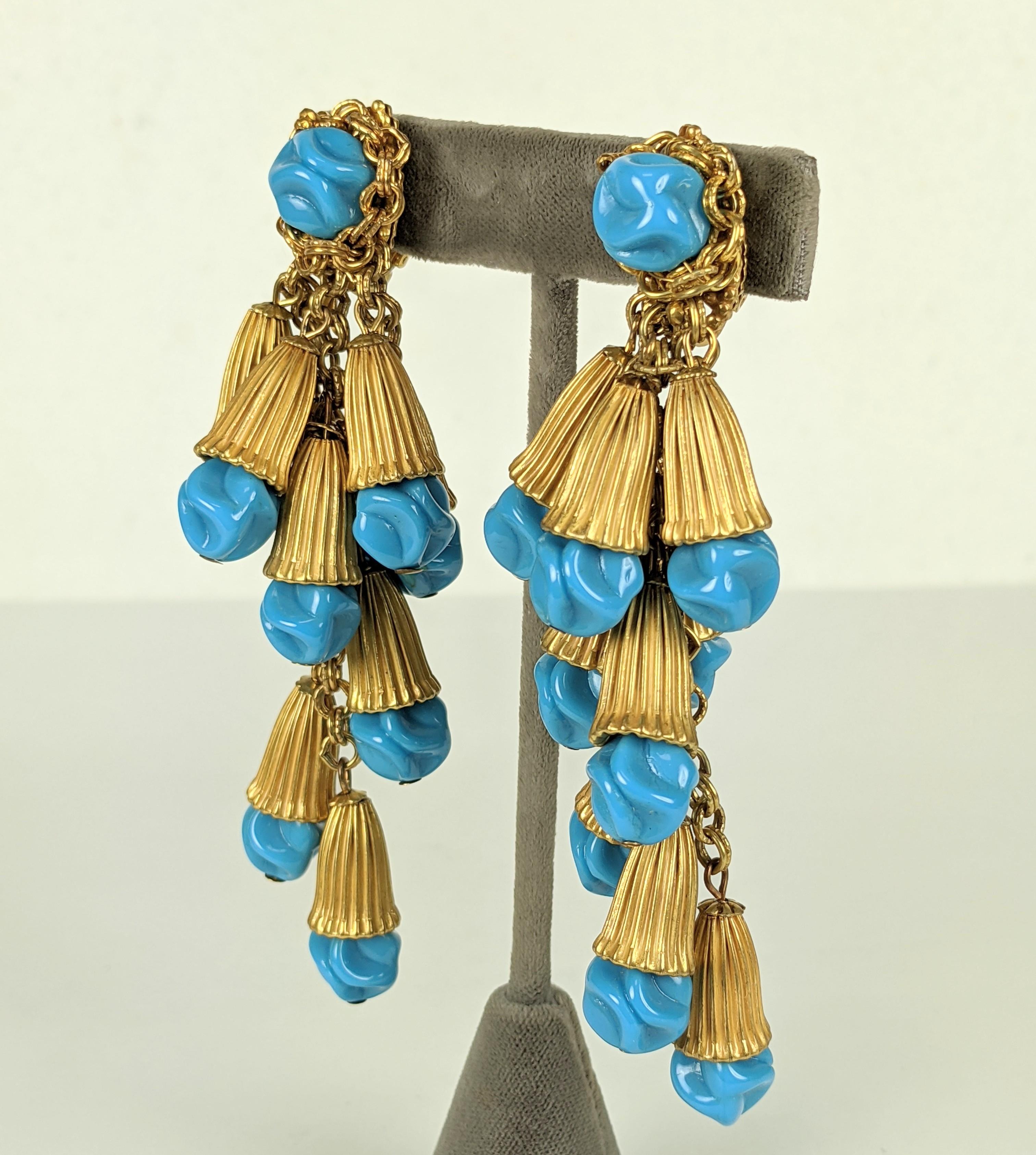 Large and impressive Miriam Haskell Ribbed Gold and Turquoise Pate de Verre ribbed bellflower earrings. Chain is used to decorate a hand made turquoise pate de verre bead which drops down to series of bellflower drops. Lovely signature Russian gold