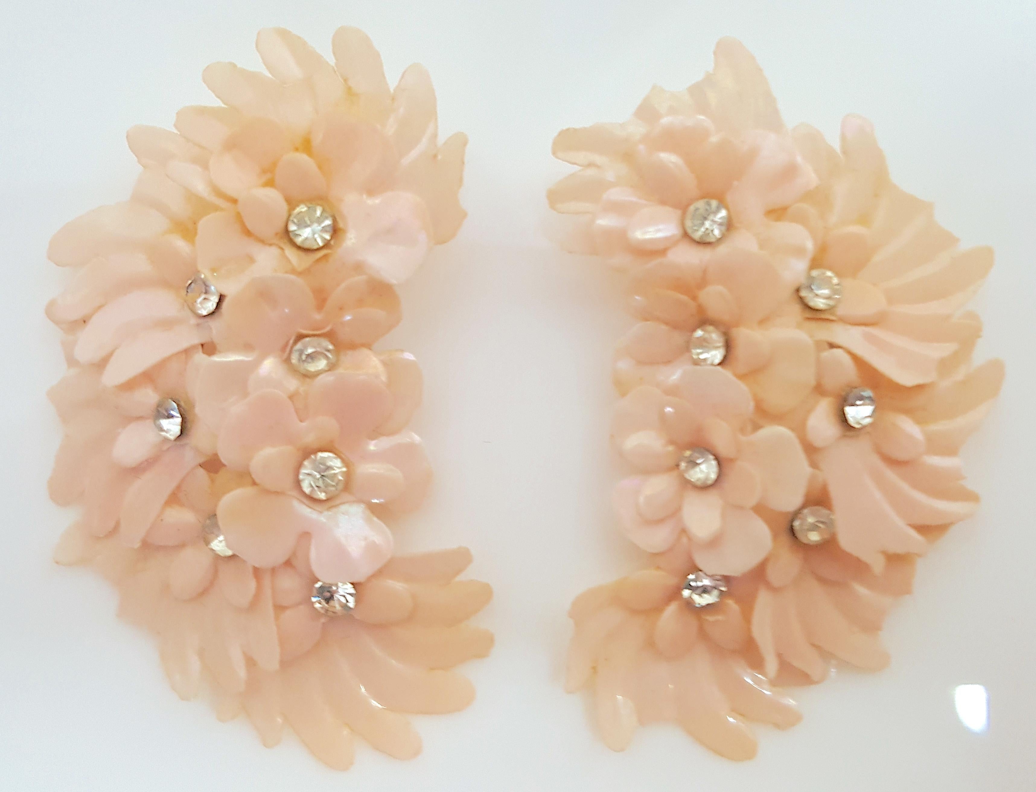 Beginning in 1939, American Miriam Haskell asked her first designer since 1926 Frank Hess to sparingly use metal in their costume-jewelry collections during WWII while war materials were needed. So not unlike the Spring/Summer 2024 floral appliques