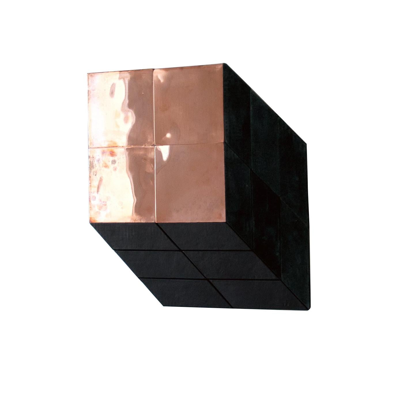 
A two-dimensional piece using polished copper and two different kind of leather. This combination creates a contrast between the materials itself and their different textures, like cold-warm, hard-soft, shining-matte. The piece hanging on the wall