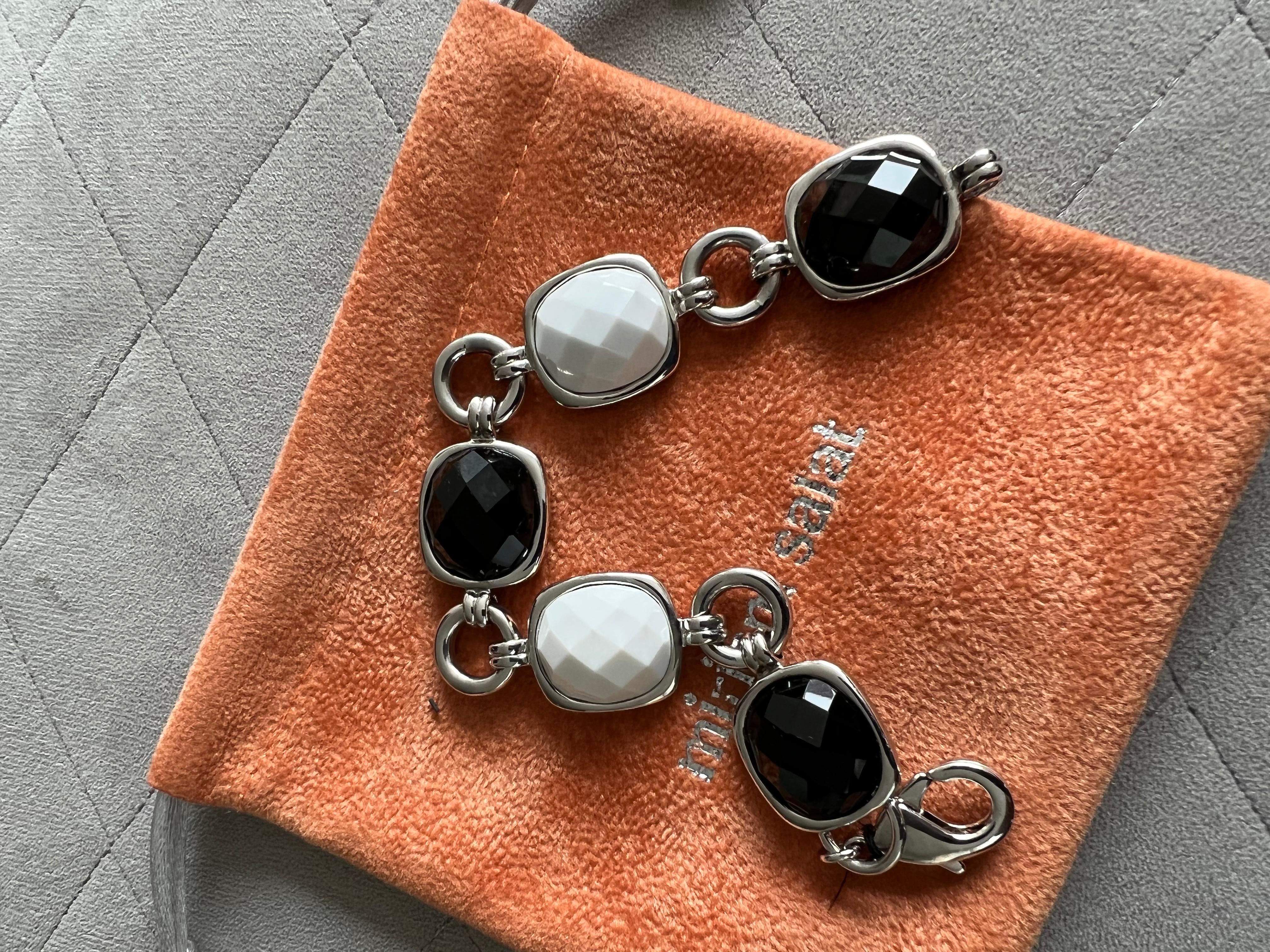 Miriam Salat Black and White resin link bracelet in resin and sterling silver. 
7.5 inch length 
Causal and dressy, day to night. This bracelet is a classic. 
Black and white Resin. 
Signed 925 Silver MRM
Comes with a Miriam Salat pouch. 
Perfect