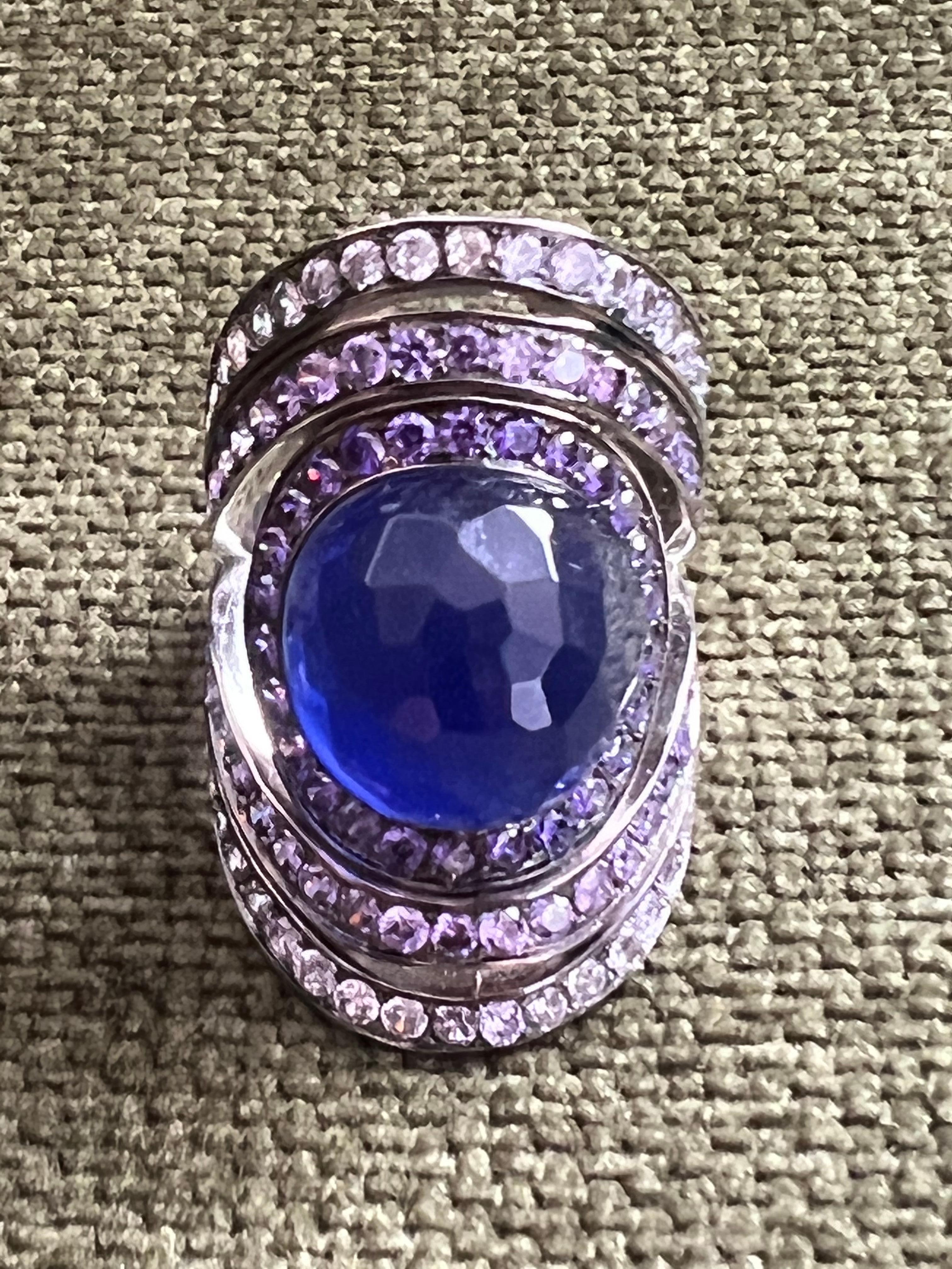 Miriam Salat Fancy Blue Cocktail Ring. 
White Topaz 
Blue Resin 
Blue and Purple Topaz 
Sterling silver 
Signed MRM
Comes with a Miriam Salat pouch. 
70s style 
Size 7 
Can be resized 