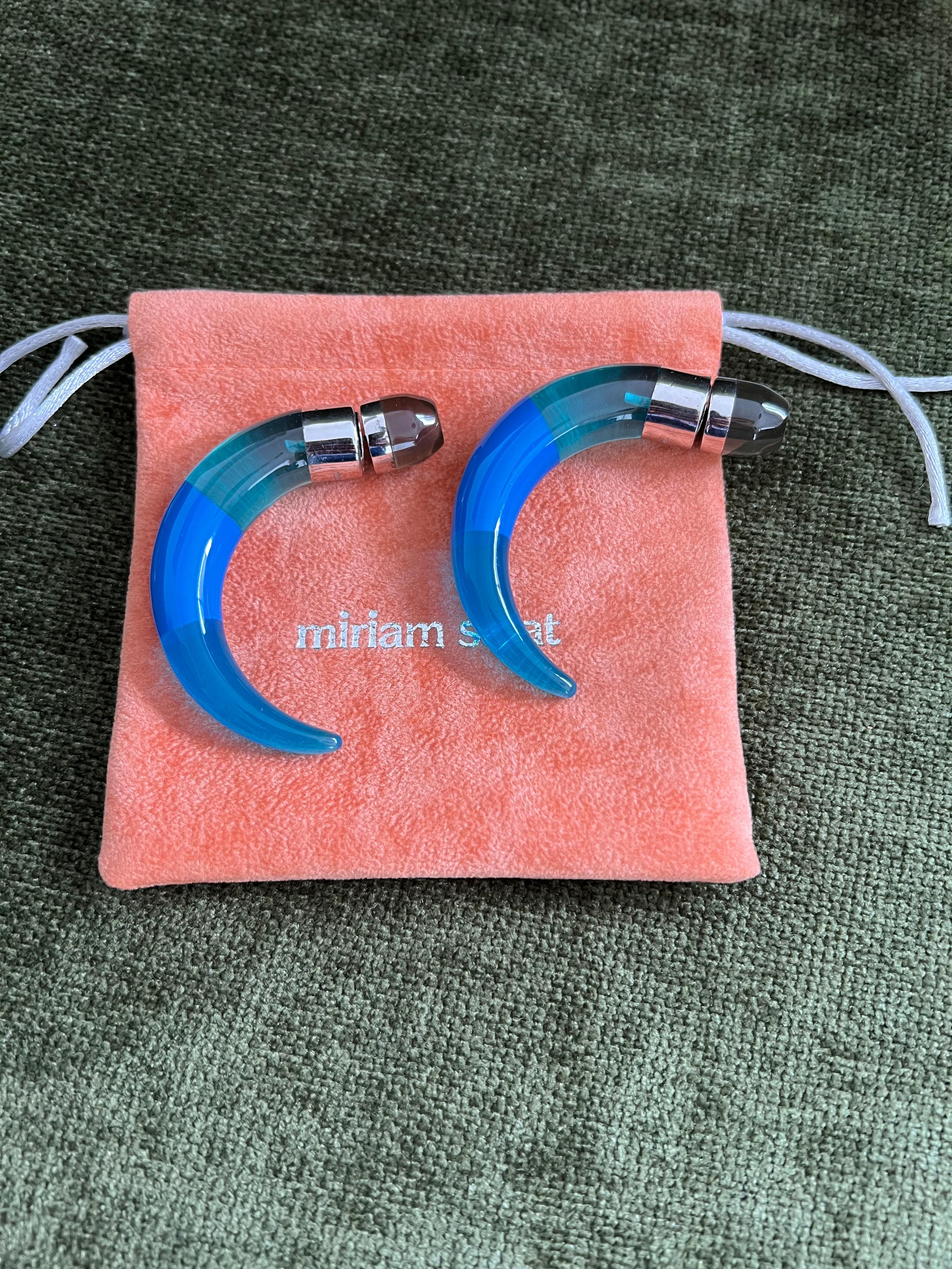 Fabulous Miriam Salat Translucent Tribal earrings, they are light and easy to wear. 
The clip on stud is also magnetic. 
Sterling silver. 
Translucent and opec resin. 
Signed MRM 750
Comes with a Miriam Salat Pouch. 
