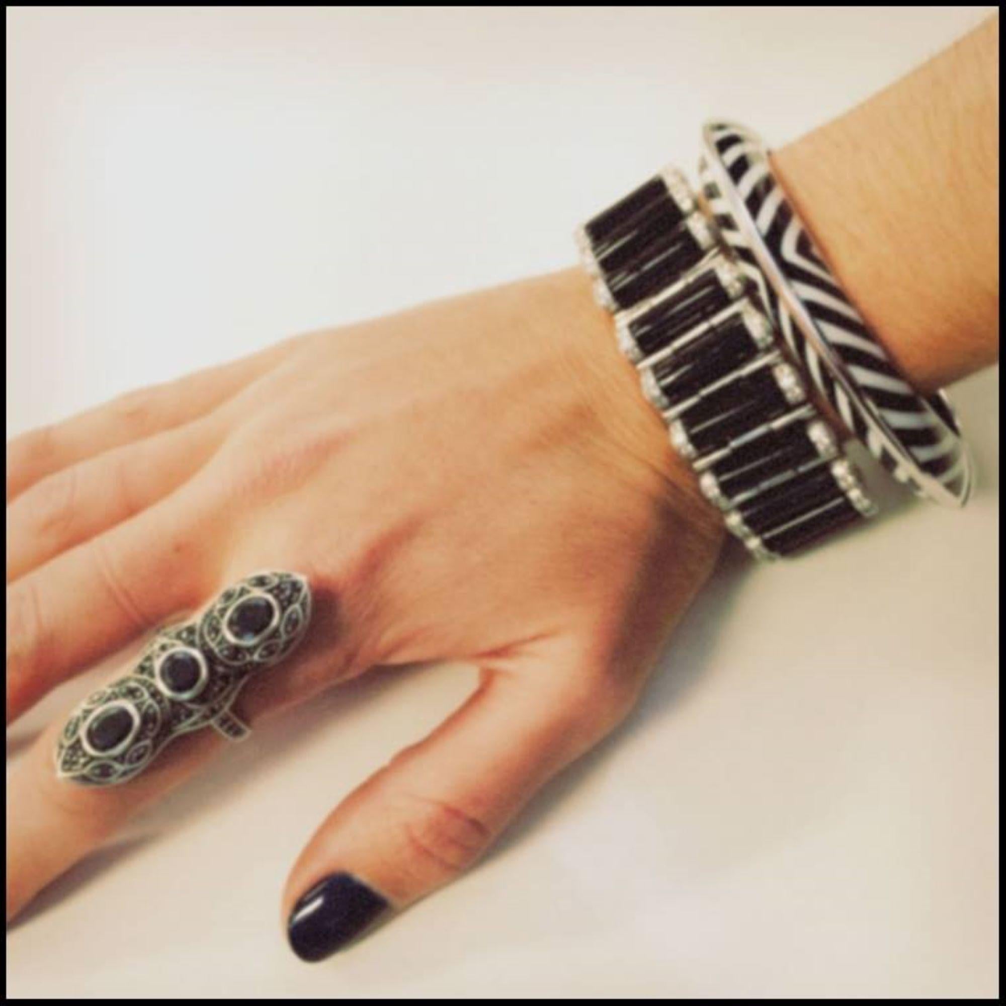 Miriam Salat Triple Noir Art Deco Ring 
Semi precious, made in vintage sterling sliver and set with black spinals. 
The setting is all hand prong setting. 
Signed MRM
Comes with a Miriam Salat pouch. 