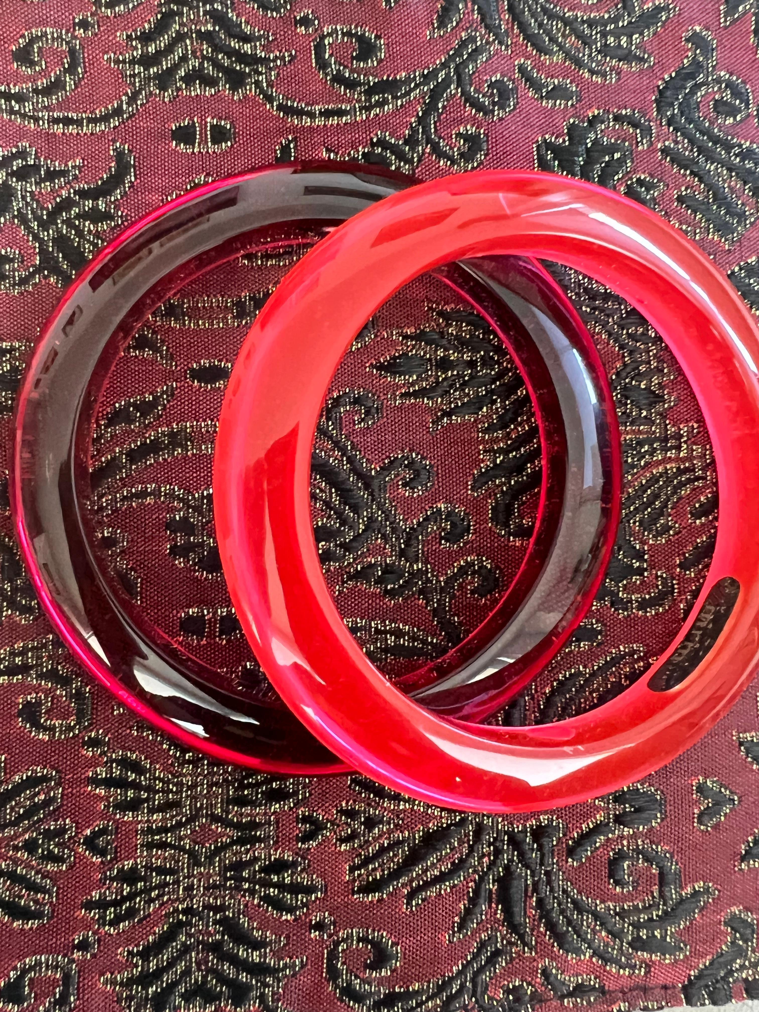 This amazing Miriam Salat Wine Red resin and sterling silver bangle is perfect for your next beach destination, perfect for layering. 
Bangle measures apx. 6-1/2 inches in circumference and apx.
1-3/4 inches in width. 
Total weight is 48.2 grams.