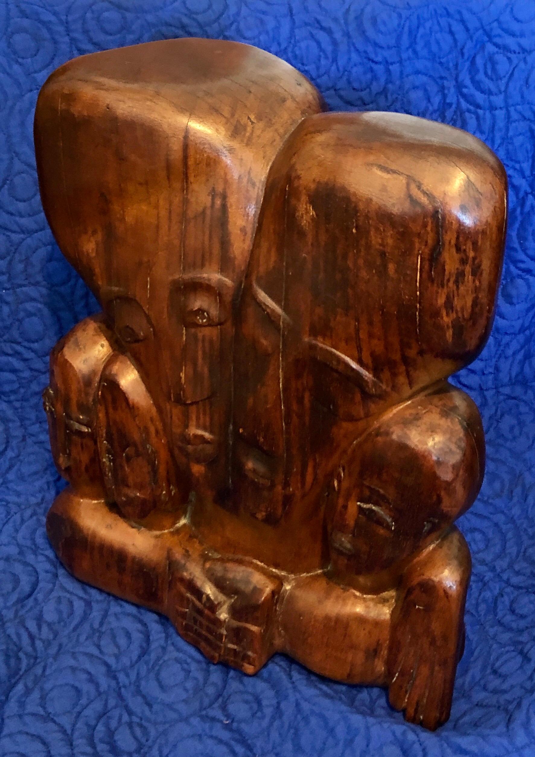 Miriam Sommerburg (American female artist, born Germany, Hamburg, 1900–1980 New York)
Modernist Wood Carved Sculpture, Carving depicting a family group. 
Before being forced to flee Germany during the outbreak of World War II, Miriam Sommerburg had