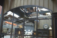 Miroir industriel arrondi en métal 1930