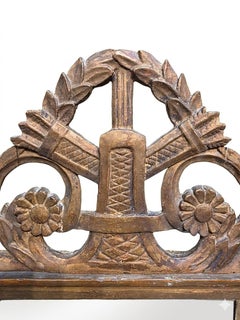 Miroir mural d'époque Louis XVI en bois sculpté et doré