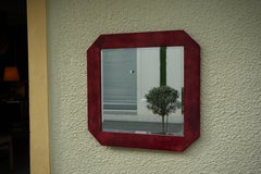 Miroir rouge en peau de chèvre laquée par Aldo Tura