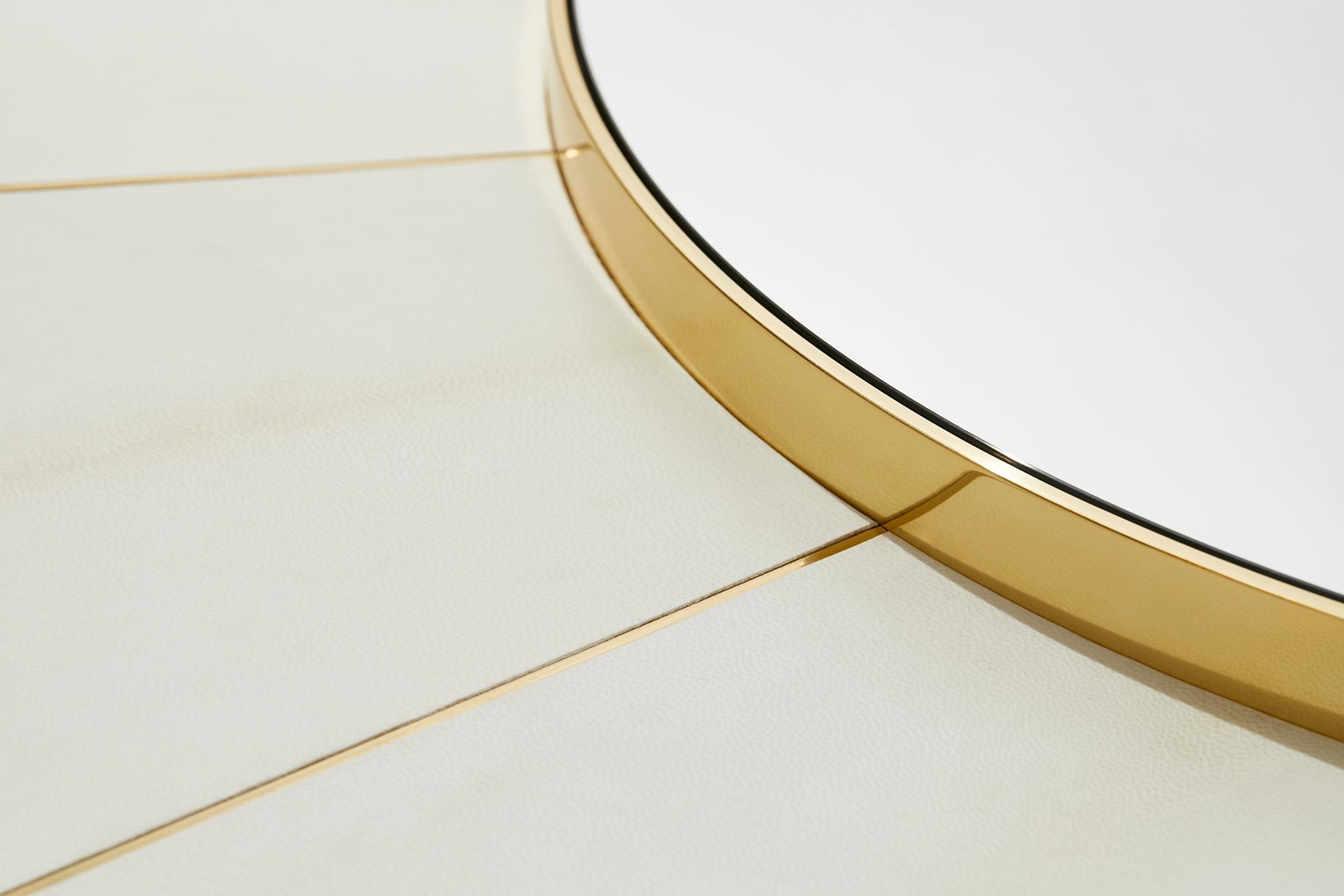 Saint Germain mirror in parchment and polished brass is a unique piece designed by Hervé Langlais for Galerie Negropontes in Paris, France.

Hervé Langlais is a graduate of the Normandy School of Architecture in Rouen. He collaborated with Paul