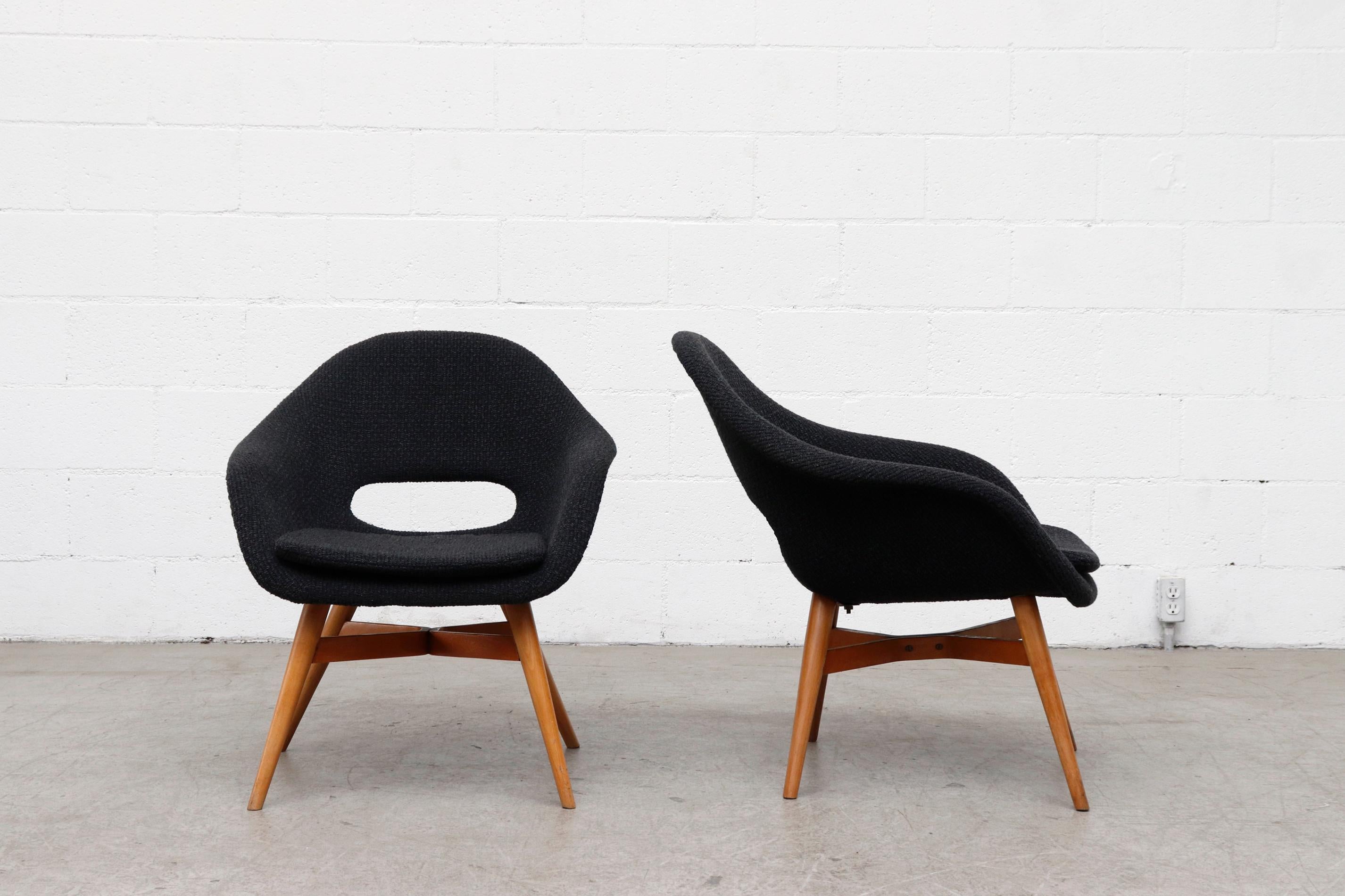 Nubby black upholstered, Mid-Century bucket chairs designed by influential Czech designer Miroslav Navrátil for the Vertex Furniture Company.  Chairs have their original birch frames. In good overall condition with some age apprpriate frame wear.