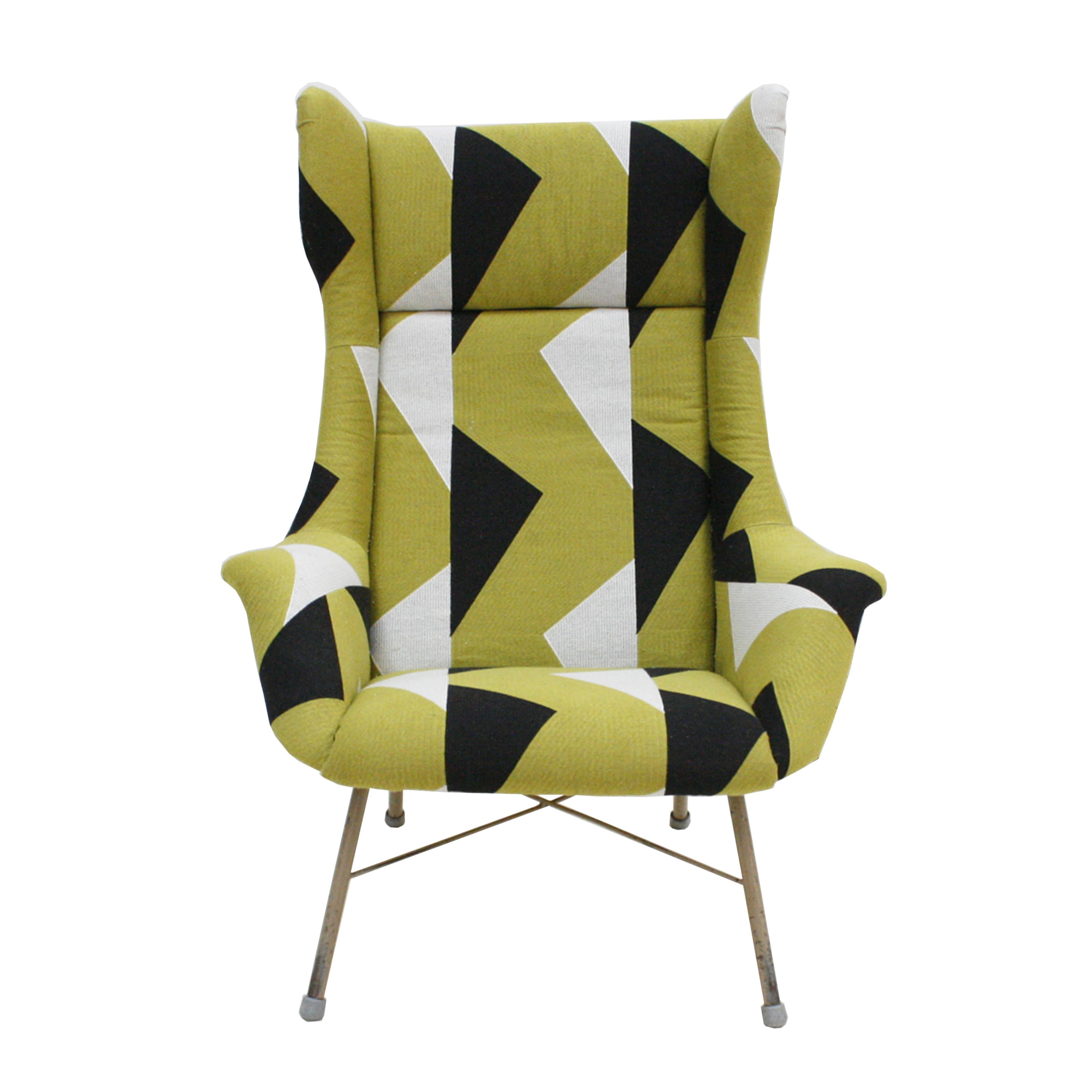 Mid-Century Modern armchair designed by Miroslav Navratil in the 1960s. The armchair is composed of a solid wood shell upholstered with a geometric motif wool fabric in green, white, and black, supported by a white lacquered metal structure.