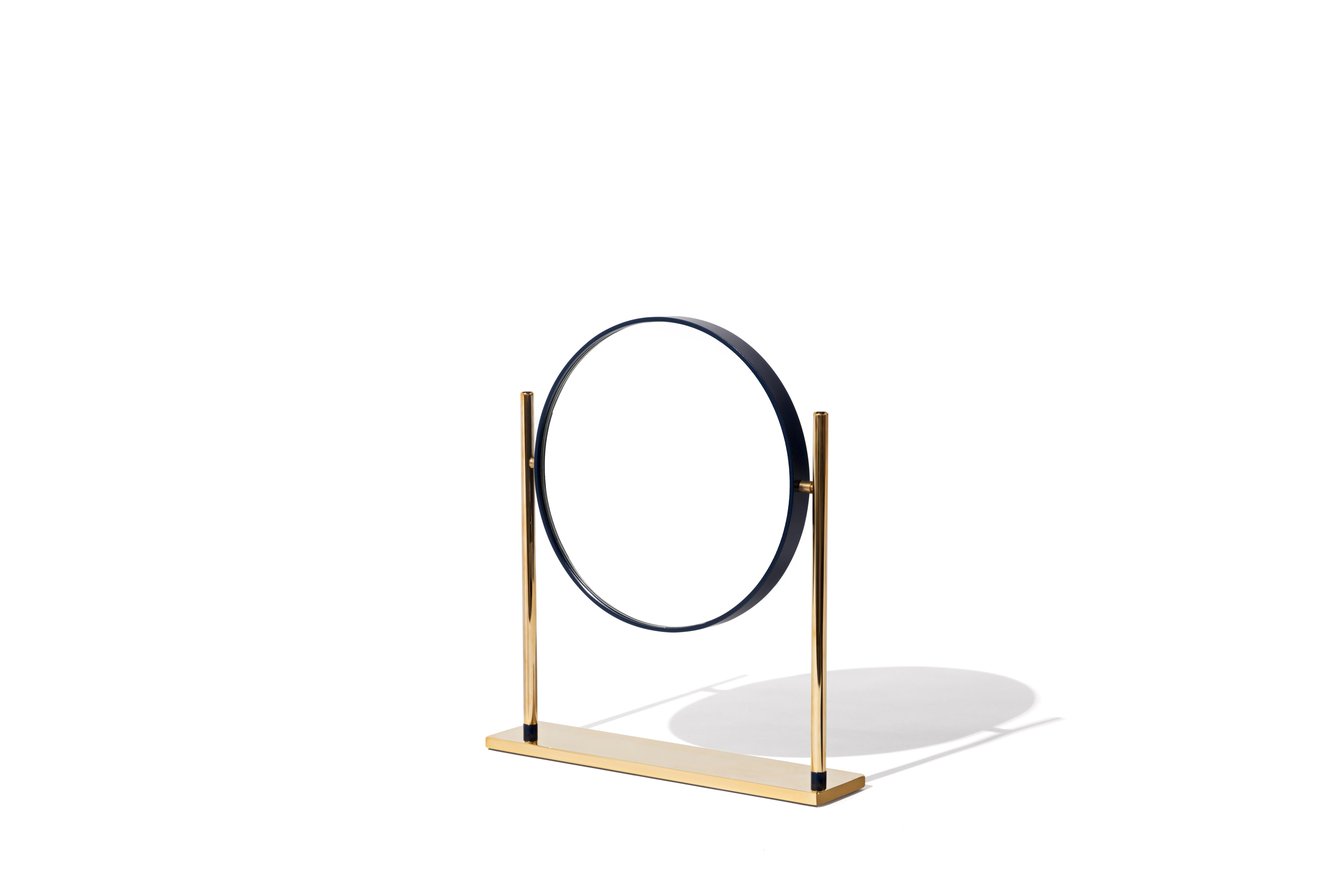Mirrò mirror by Mingardo
Dimensions: D 26 x W 6 x H 32 cm 
Materials: Iron and natural brass, mirror
Weight: 4 kg

Also available in different finishes. 

Mirrò is a small desktop and bathroom mirror, a precious linear object that displays
