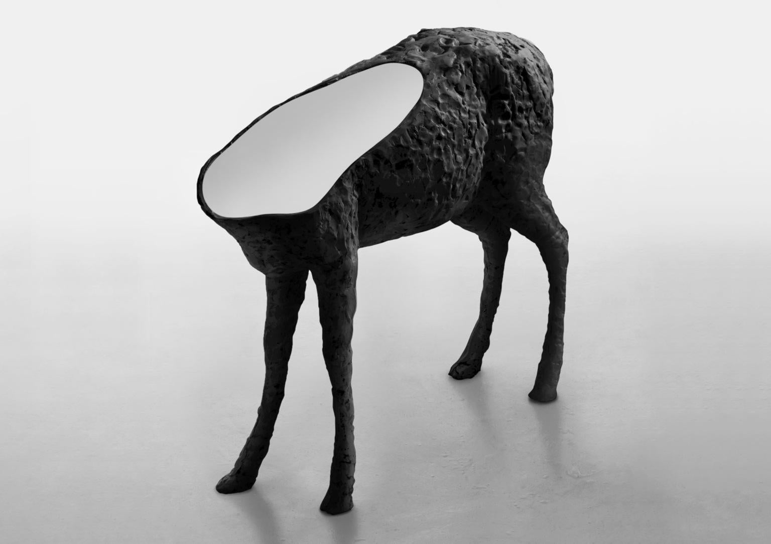 Mirroe sculptured mirror by Imperfettolab
Dimensions: W 110 x D 32 x H 90 cm
Materials: Fiberglass, mirror
Available in 2 colors: black, white.
 
A mirror that seems to come from a dream in which creatures of the animal world and symbolic